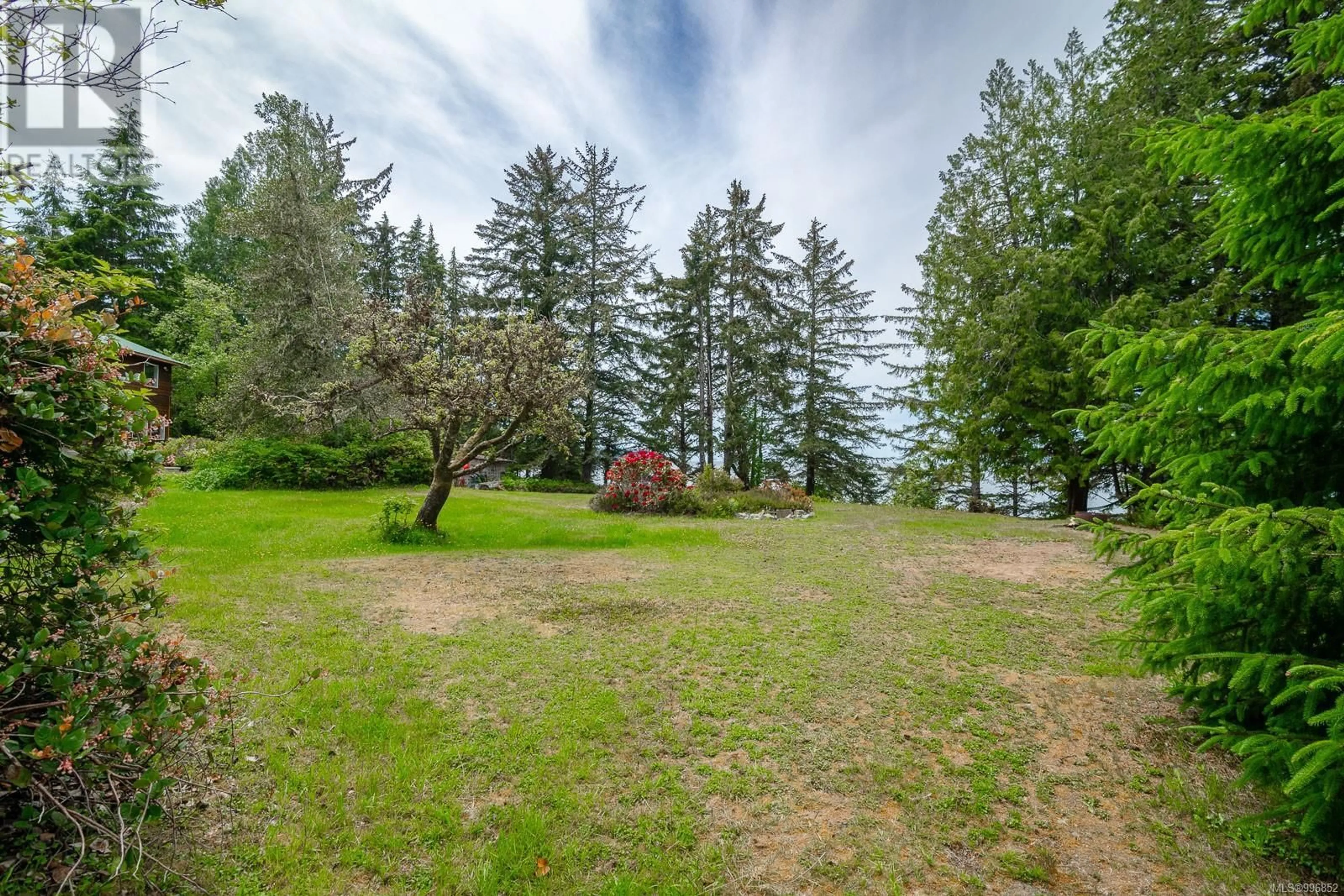 A pic from outside/outdoor area/front of a property/back of a property/a pic from drone, forest/trees view for 100 MATHERS LANE, Bamfield British Columbia V0R1B0