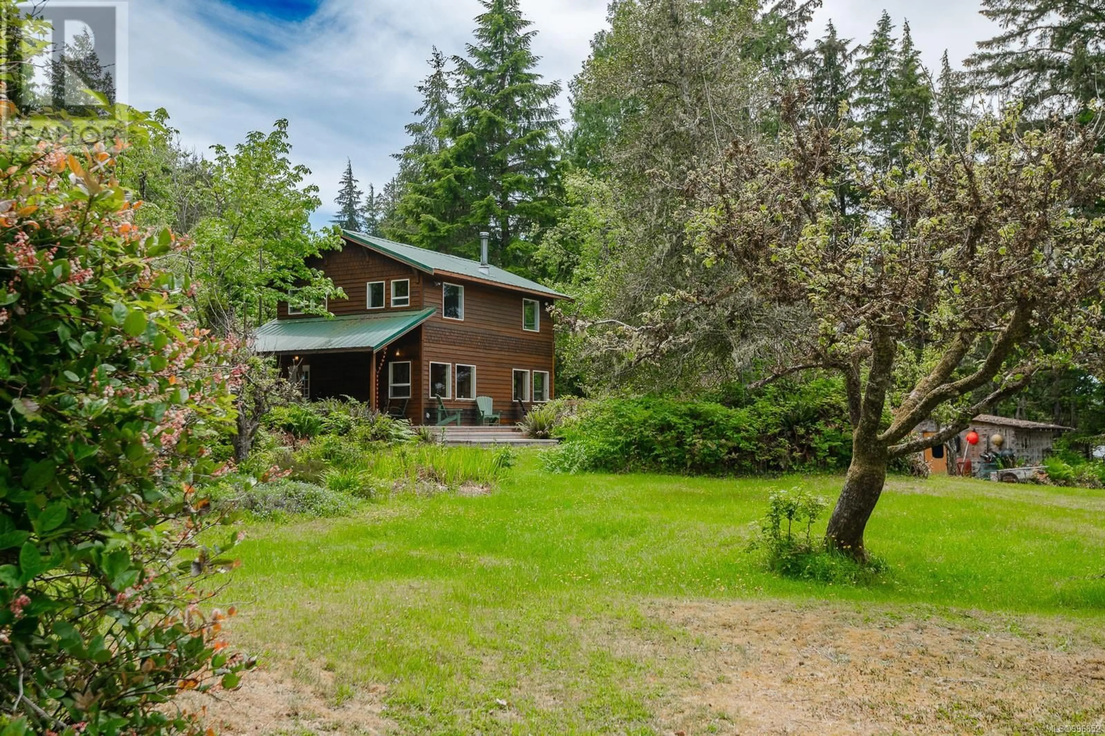 A pic from outside/outdoor area/front of a property/back of a property/a pic from drone, forest/trees view for 100 MATHERS LANE, Bamfield British Columbia V0R1B0