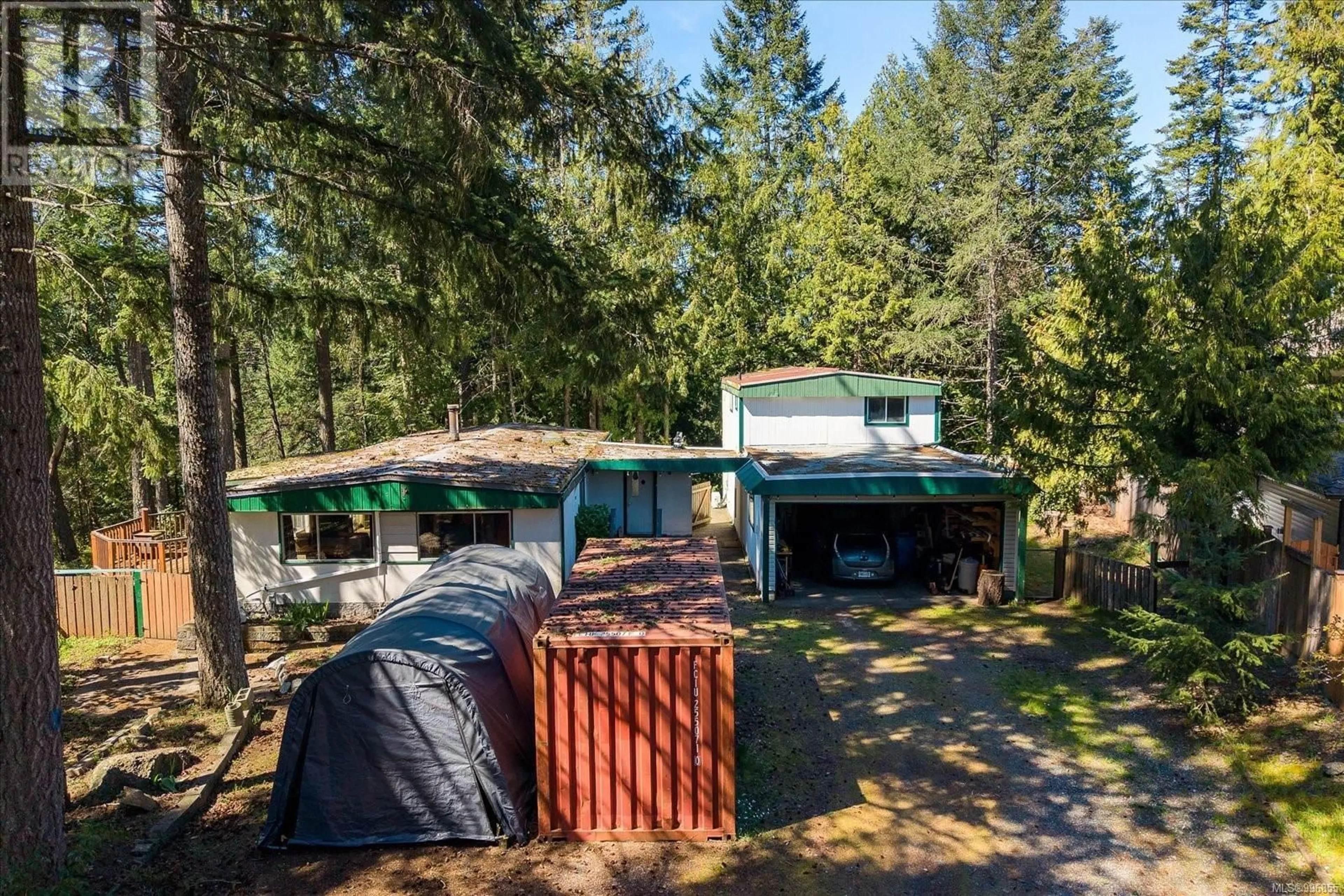 A pic from outside/outdoor area/front of a property/back of a property/a pic from drone, forest/trees view for 69 LAKE PLACE, Nanaimo British Columbia V9T5S1