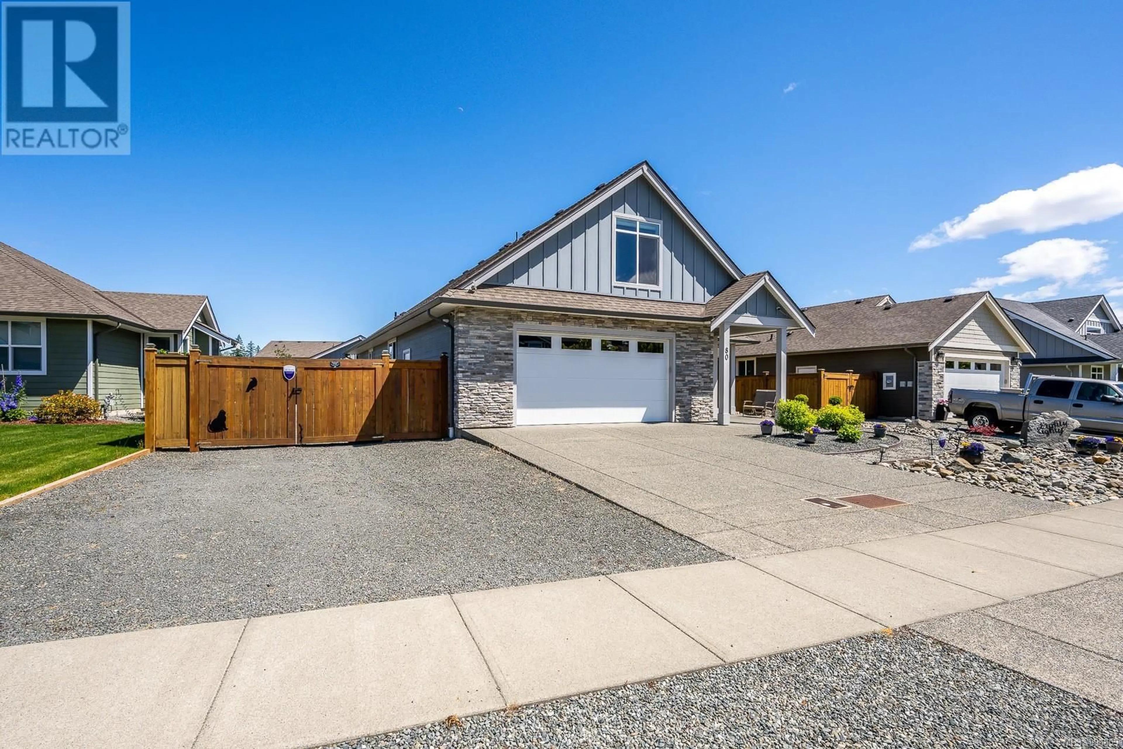 Home with vinyl exterior material, street for 80 NIKOLA ROAD, Campbell River British Columbia V9W0C9