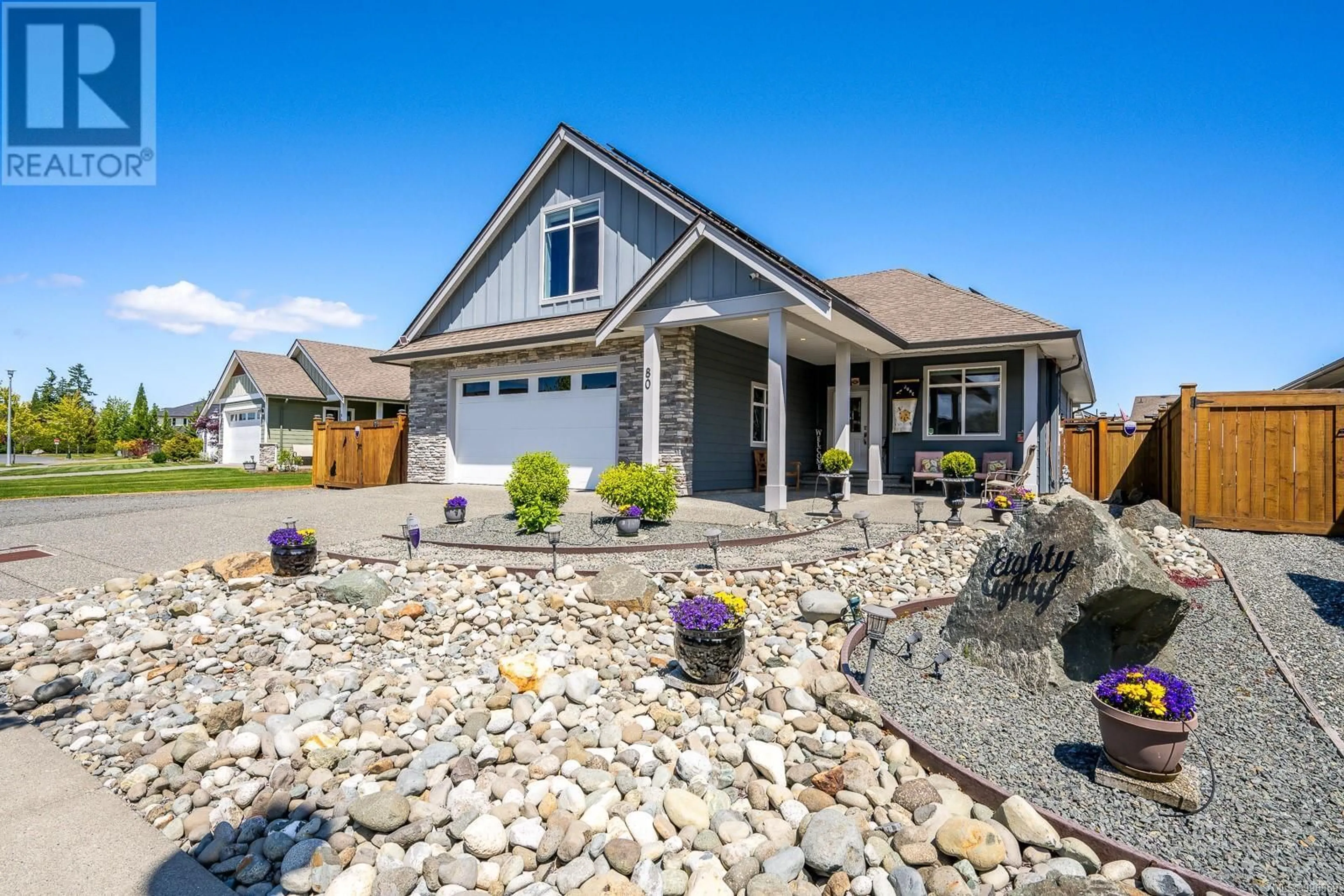Home with vinyl exterior material, street for 80 NIKOLA ROAD, Campbell River British Columbia V9W0C9
