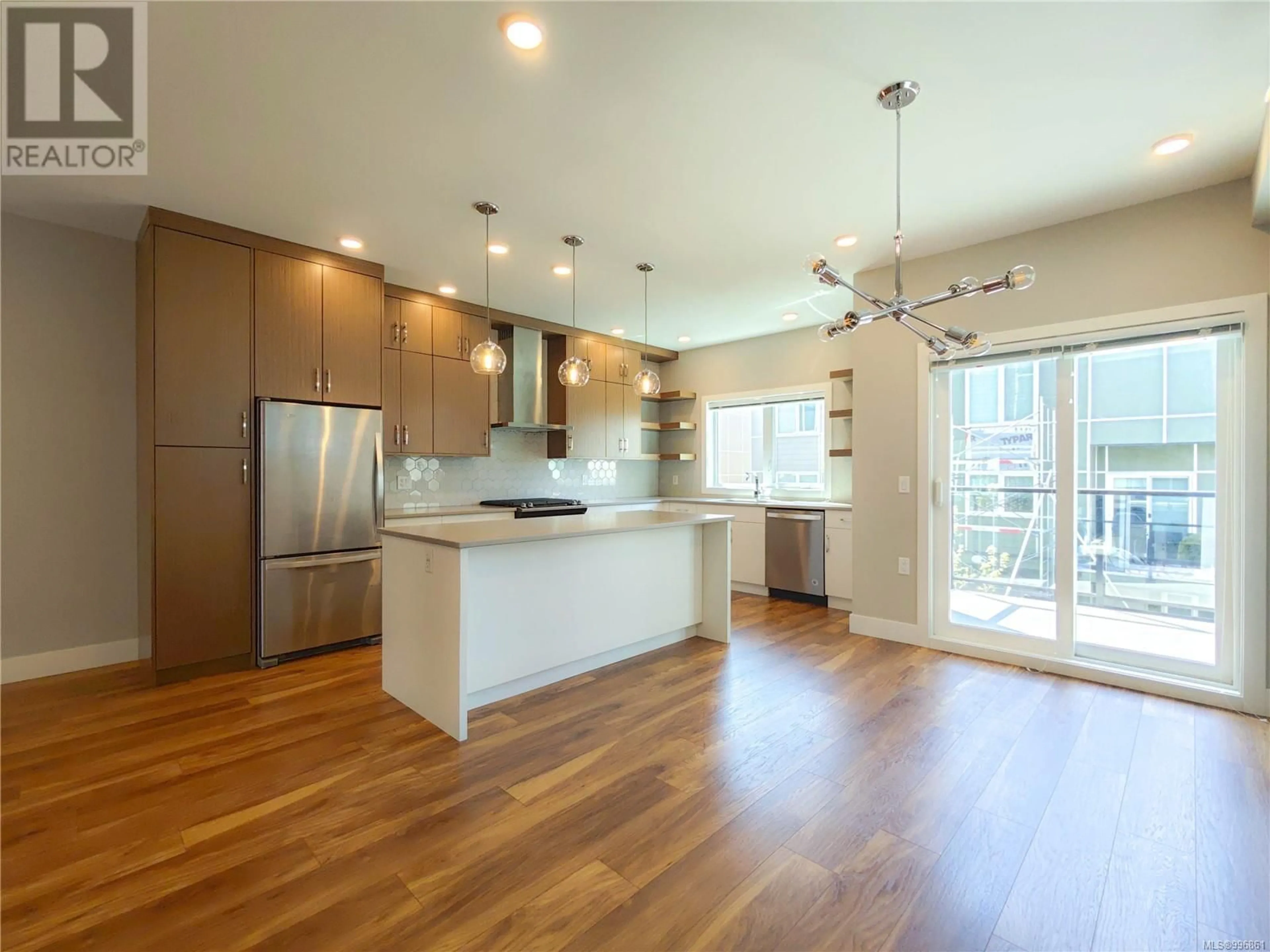 Open concept kitchen, wood/laminate floor for 14 - 4355 VIEWMONT AVENUE, Saanich British Columbia V8Z5K8