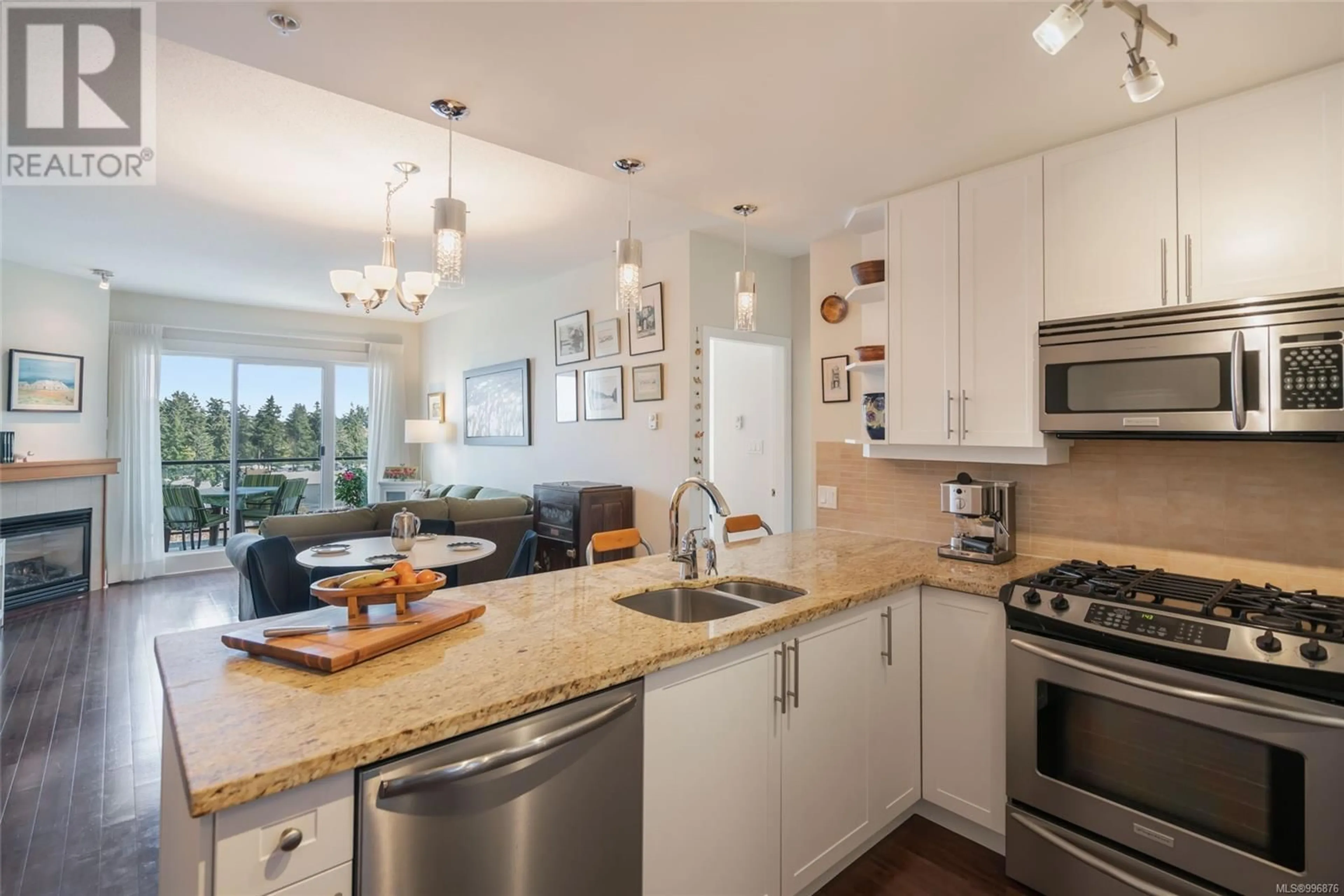 Open concept kitchen, ceramic/tile floor for 604 - 194 BEACHSIDE DRIVE, Parksville British Columbia V9P0B1