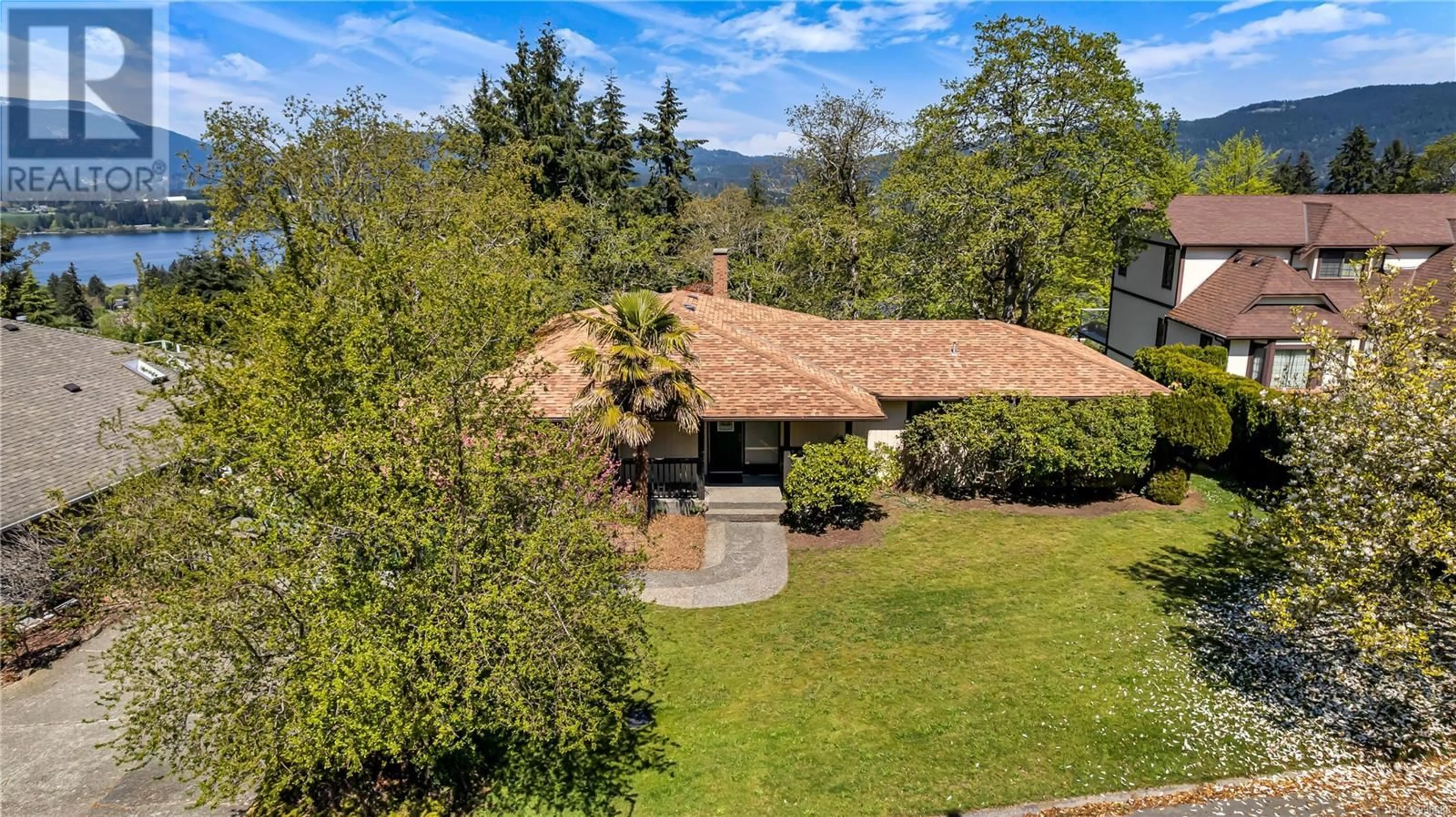 A pic from outside/outdoor area/front of a property/back of a property/a pic from drone, mountain view for 1469 HAIDA ROAD, Duncan British Columbia V9L5P4
