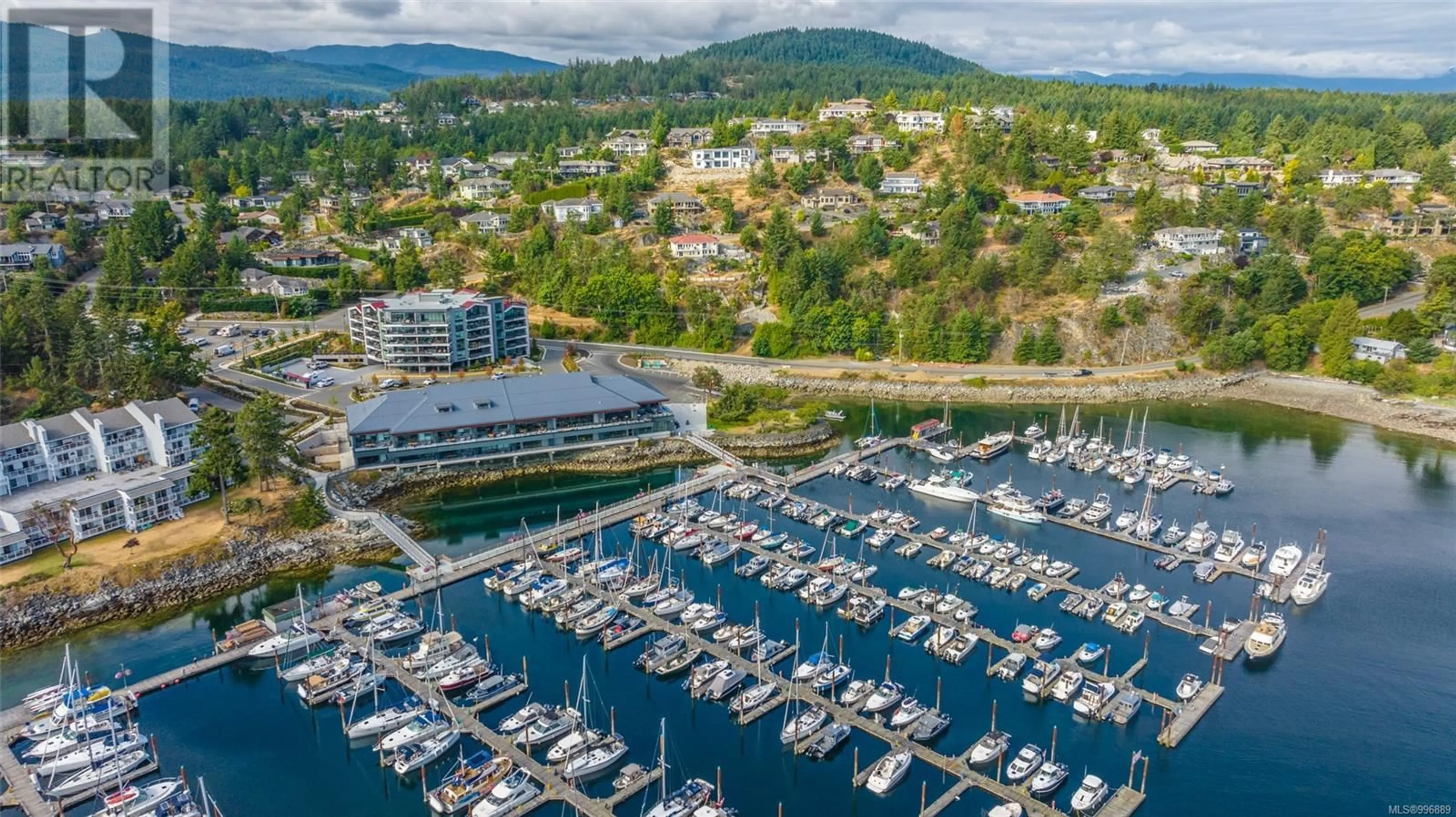 A pic from outside/outdoor area/front of a property/back of a property/a pic from drone, water/lake/river/ocean view for 207 - 3529 DOLPHIN DRIVE, Nanoose Bay British Columbia V9P9J1