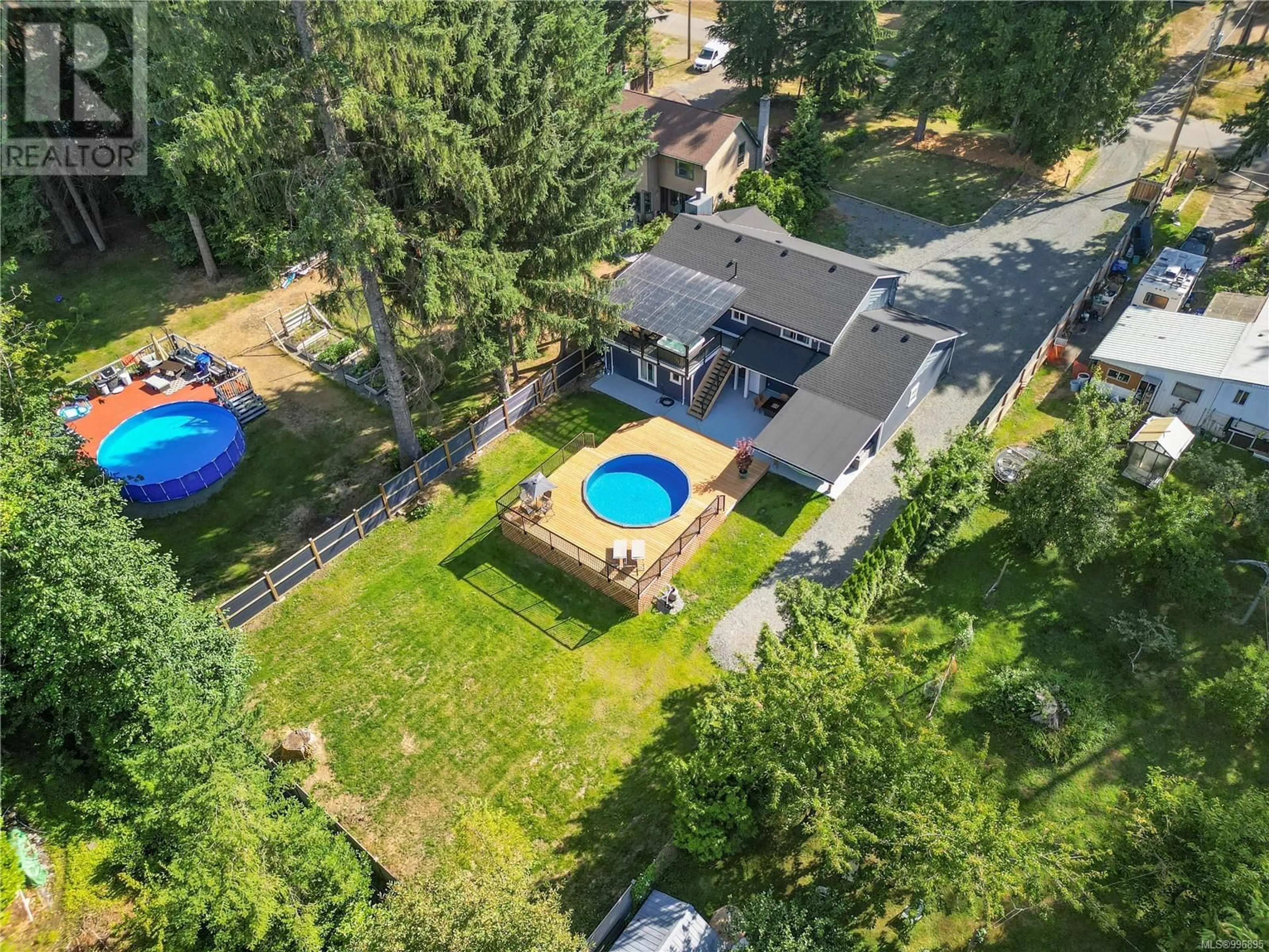 A pic from outside/outdoor area/front of a property/back of a property/a pic from drone, water/lake/river/ocean view for 84 LEASH ROAD, Courtenay British Columbia V9N9V2
