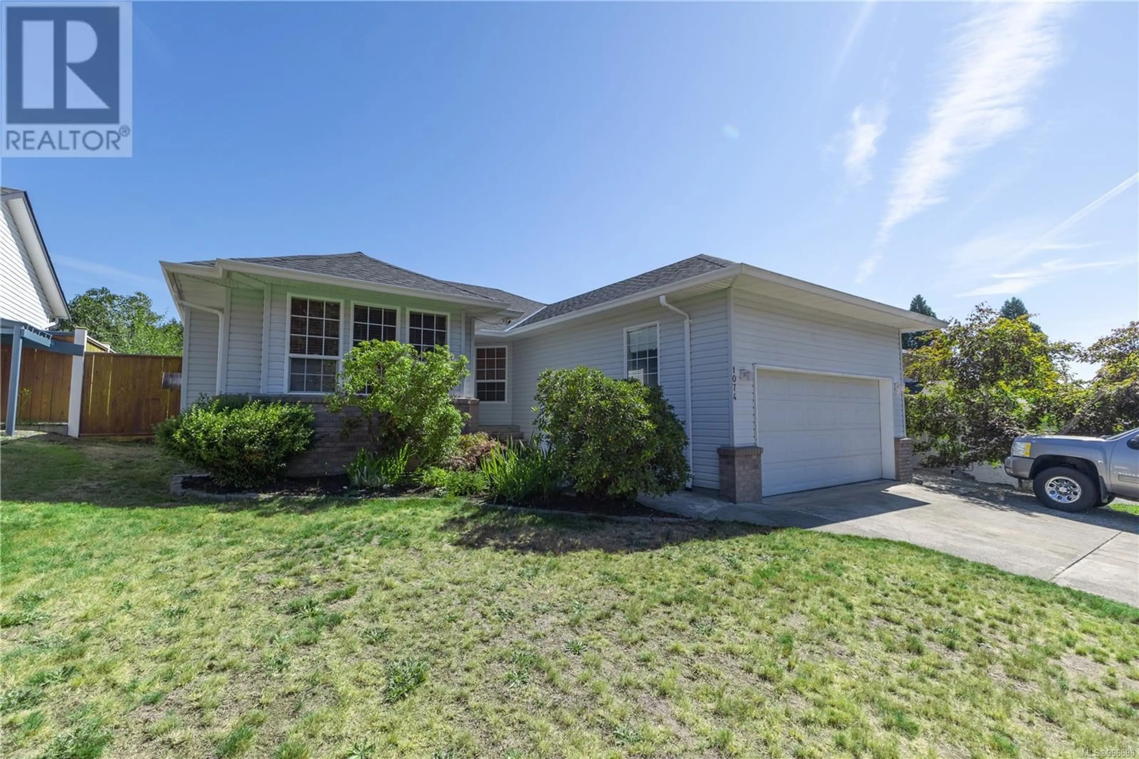 Home with vinyl exterior material, street for 1074 SPRINGBOK ROAD, Campbell River British Columbia V9W7K7