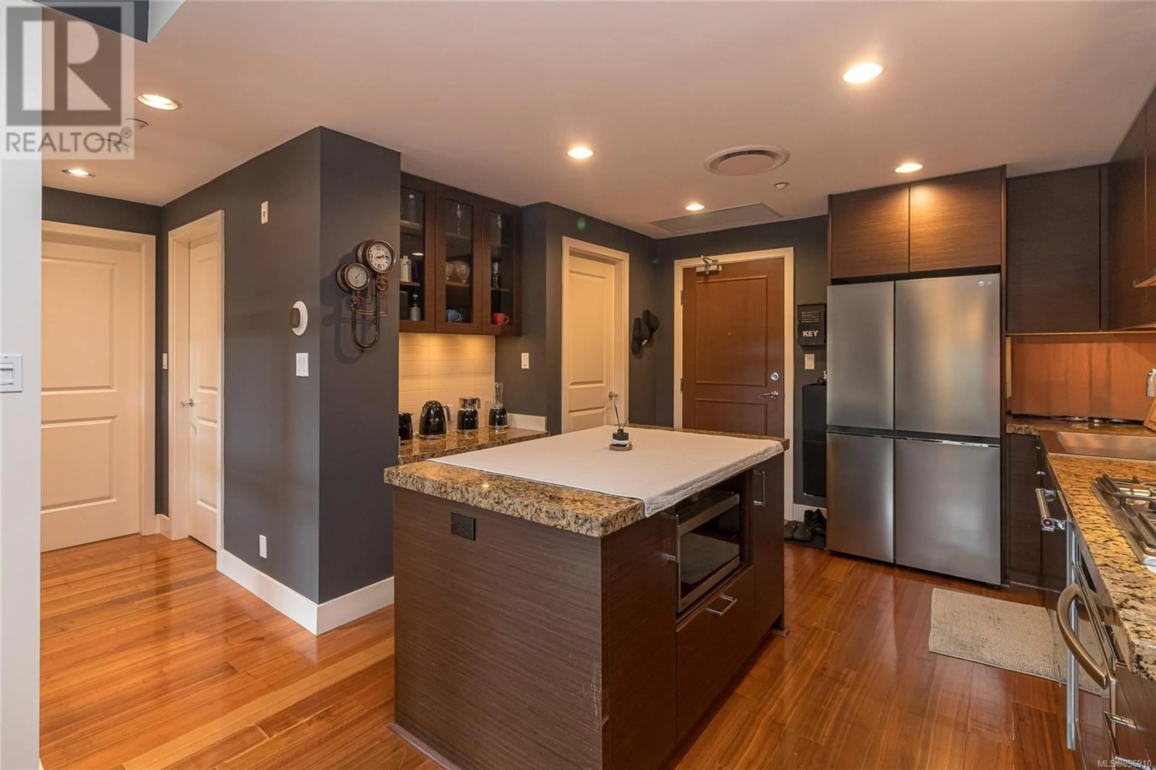 Open concept kitchen, wood/laminate floor for 608 - 1400 LYNBURNE PLACE, Langford British Columbia V9B0A4