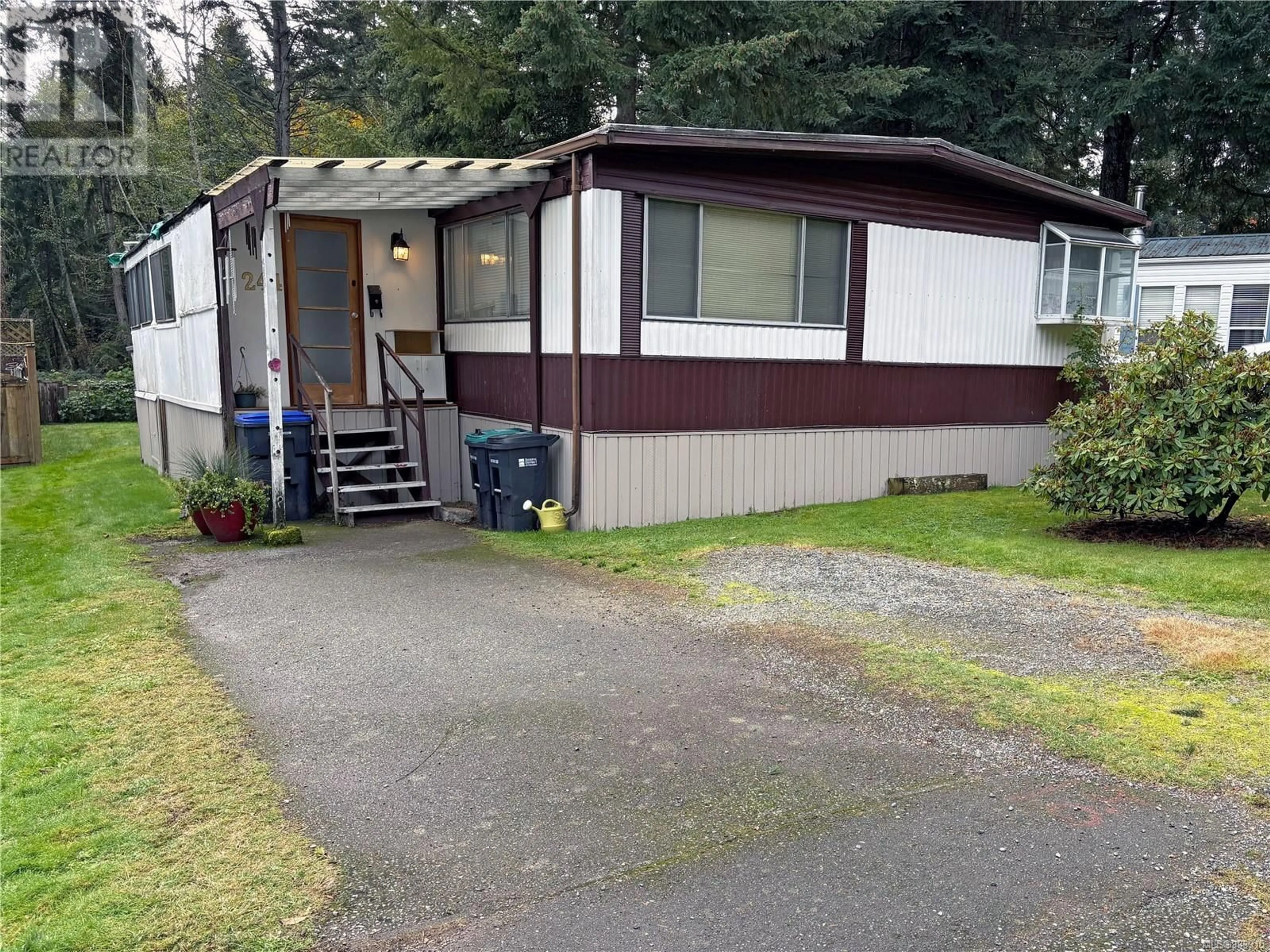 Home with vinyl exterior material, street for 244 - 2465 APOLLO DRIVE, Nanoose Bay British Columbia V9P9K2