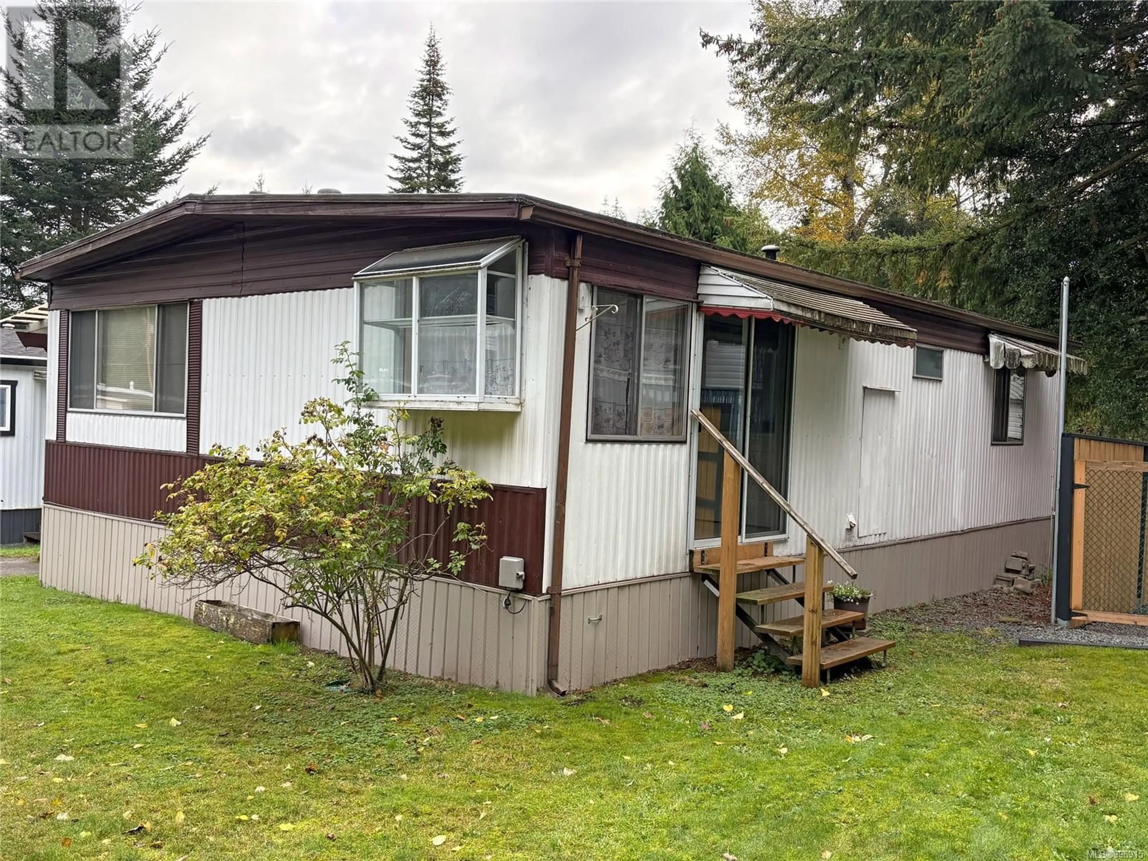 Home with vinyl exterior material, street for 244 - 2465 APOLLO DRIVE, Nanoose Bay British Columbia V9P9K2