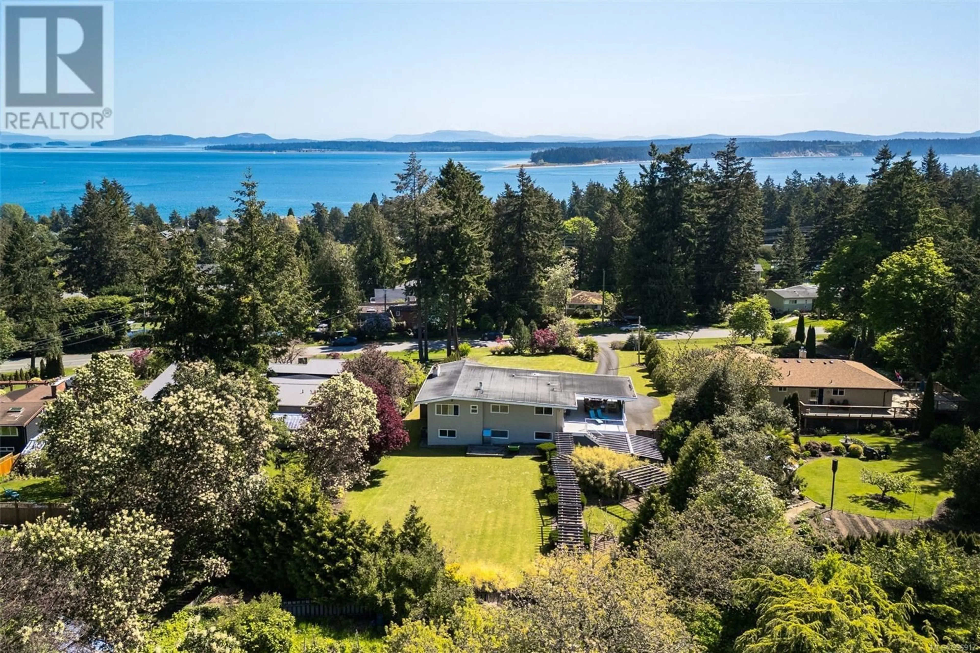 A pic from outside/outdoor area/front of a property/back of a property/a pic from drone, water/lake/river/ocean view for 8564 MOXON TERRACE, North Saanich British Columbia V8L1K6