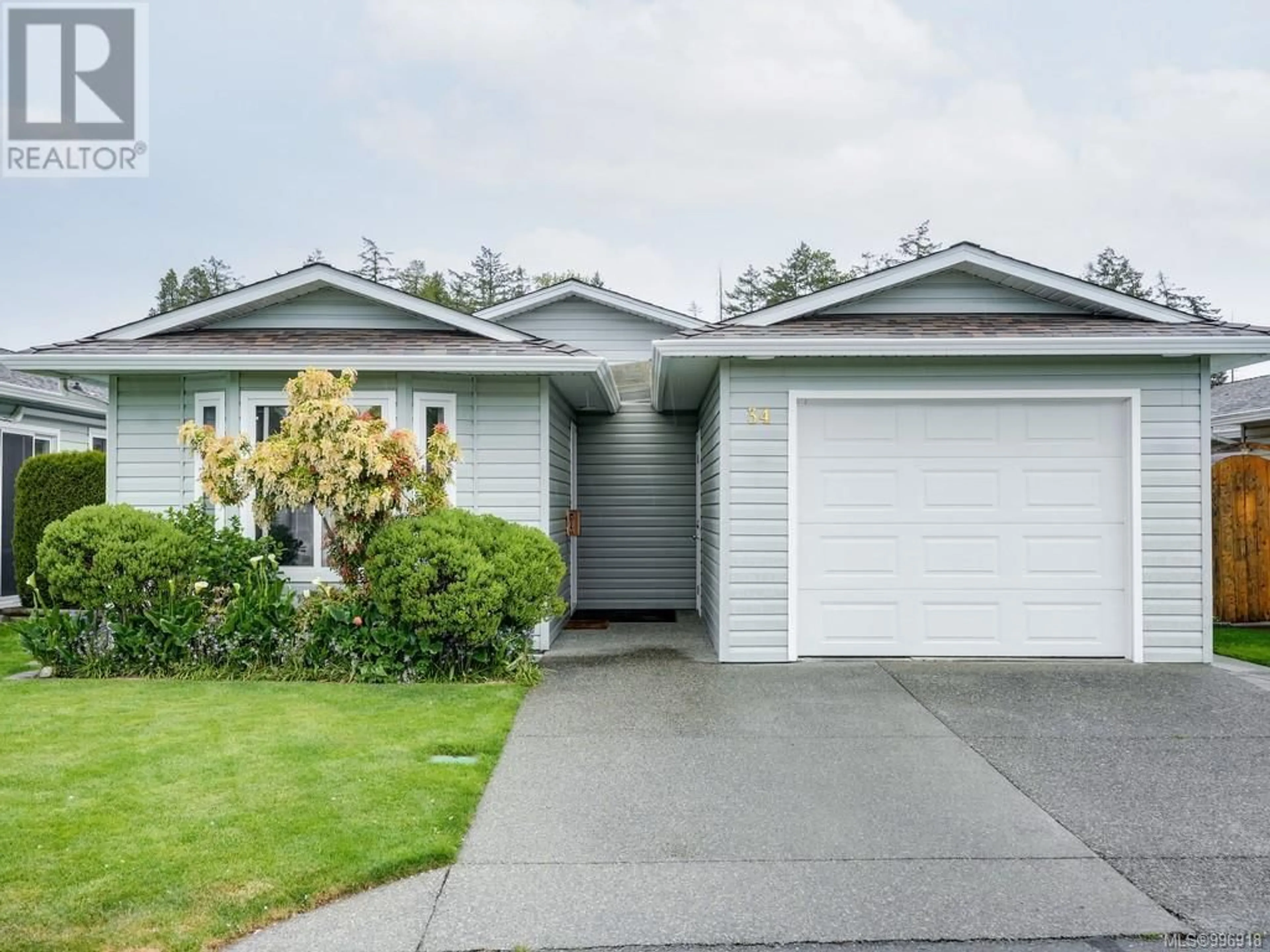 Home with vinyl exterior material, street for 34 - 7570 TETAYUT ROAD, Central Saanich British Columbia V8M2H4