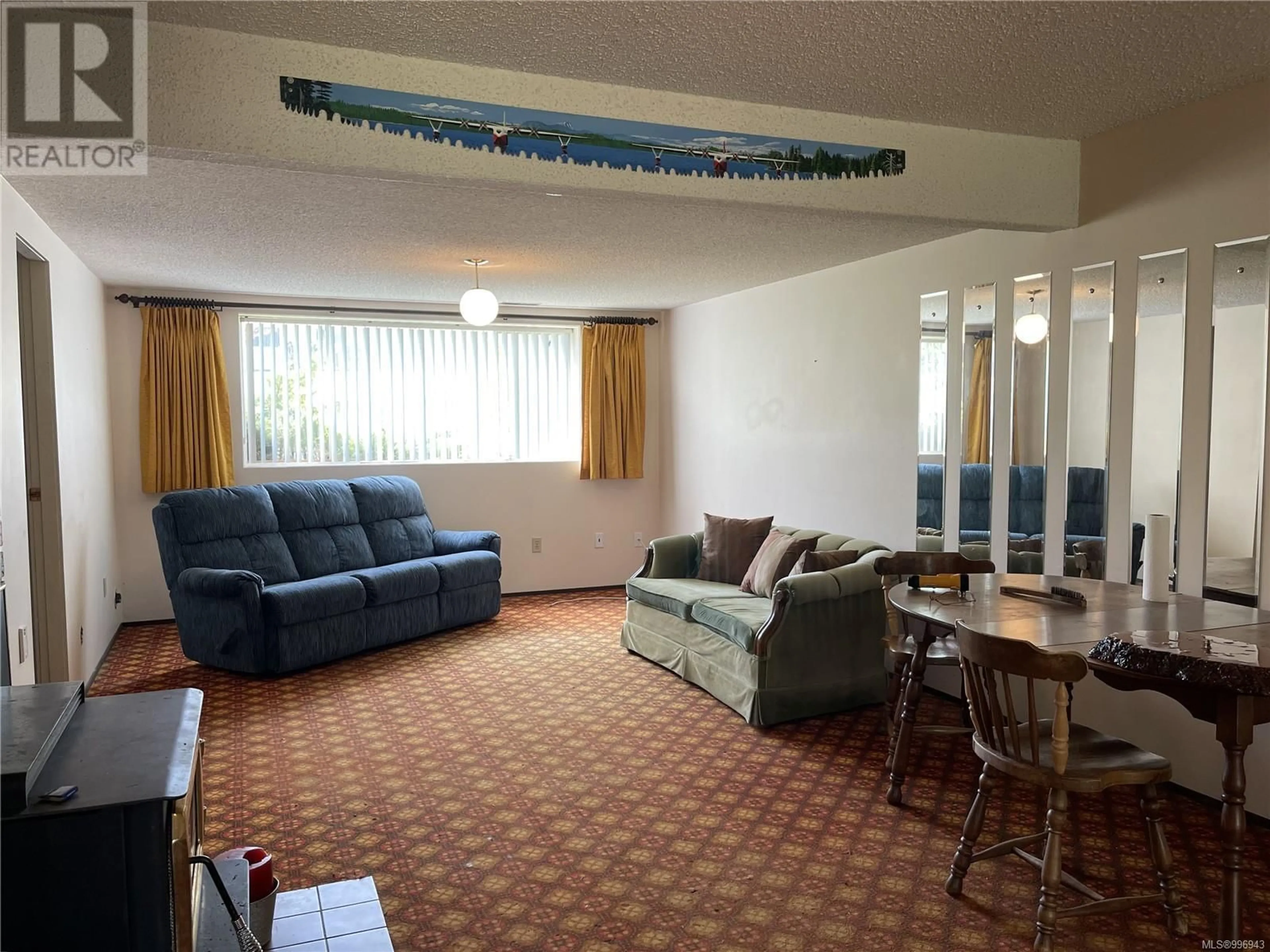 Living room with furniture, carpet floor for 3553 MARKHAM ROAD, Port Alberni British Columbia V9Y8T1