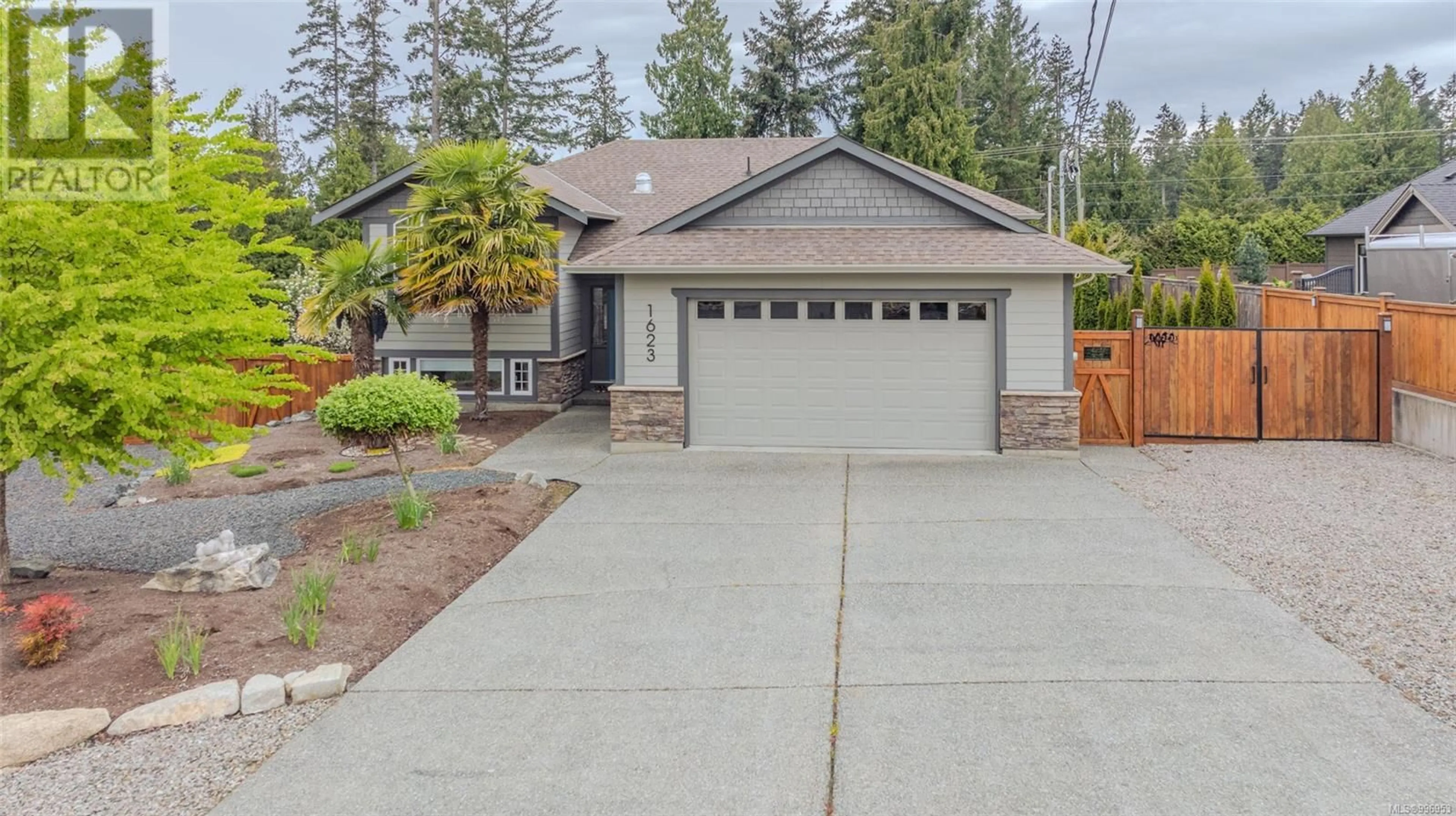 Home with vinyl exterior material, street for 1623 STONE LAKE DRIVE, Nanoose Bay British Columbia V9P9L1