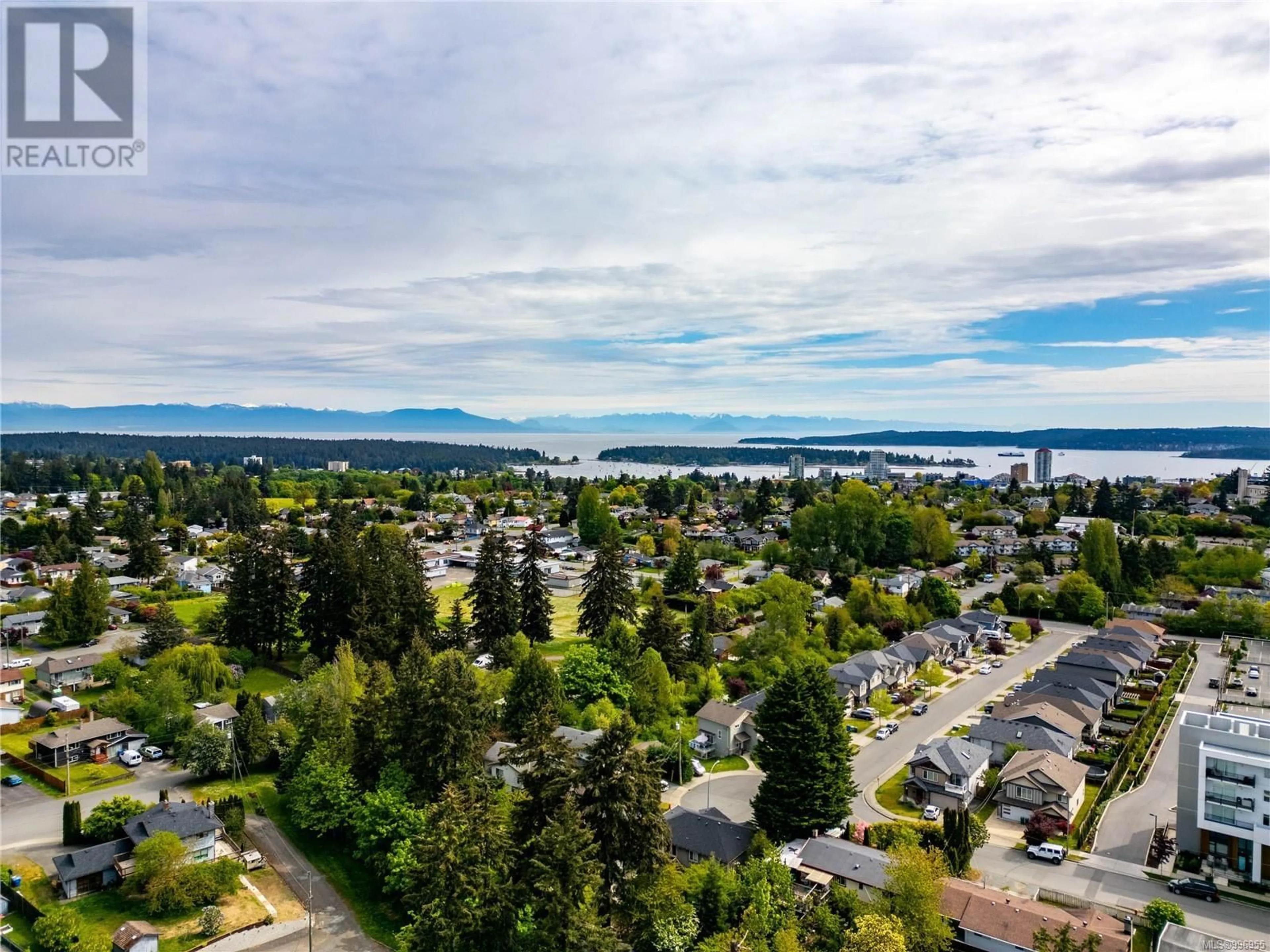A pic from outside/outdoor area/front of a property/back of a property/a pic from drone, water/lake/river/ocean view for 103 - 690 THIRD STREET, Nanaimo British Columbia V9R1W8
