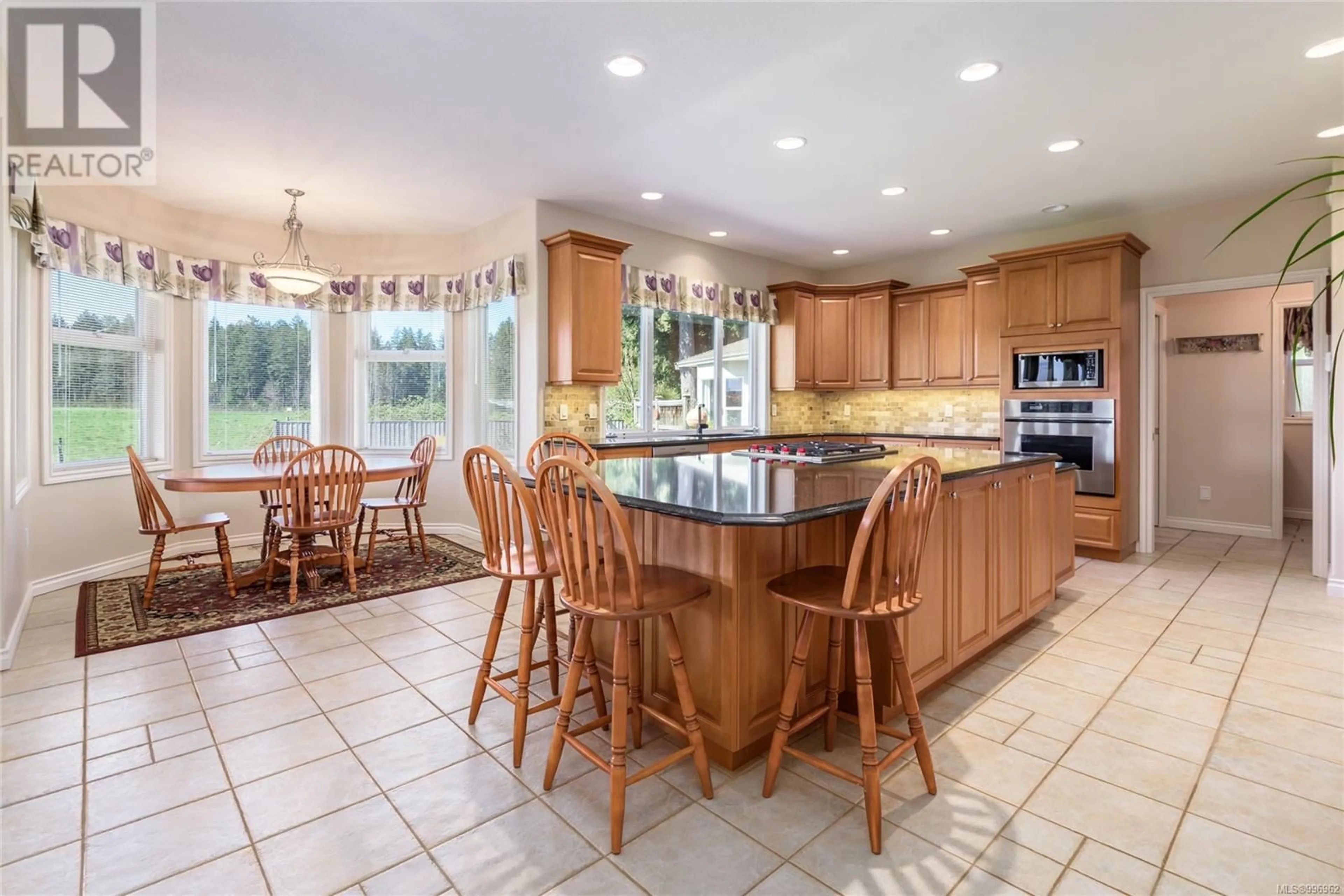 Open concept kitchen, ceramic/tile floor for 1009 KINGSLEY CRESCENT, Comox British Columbia V9M3R7
