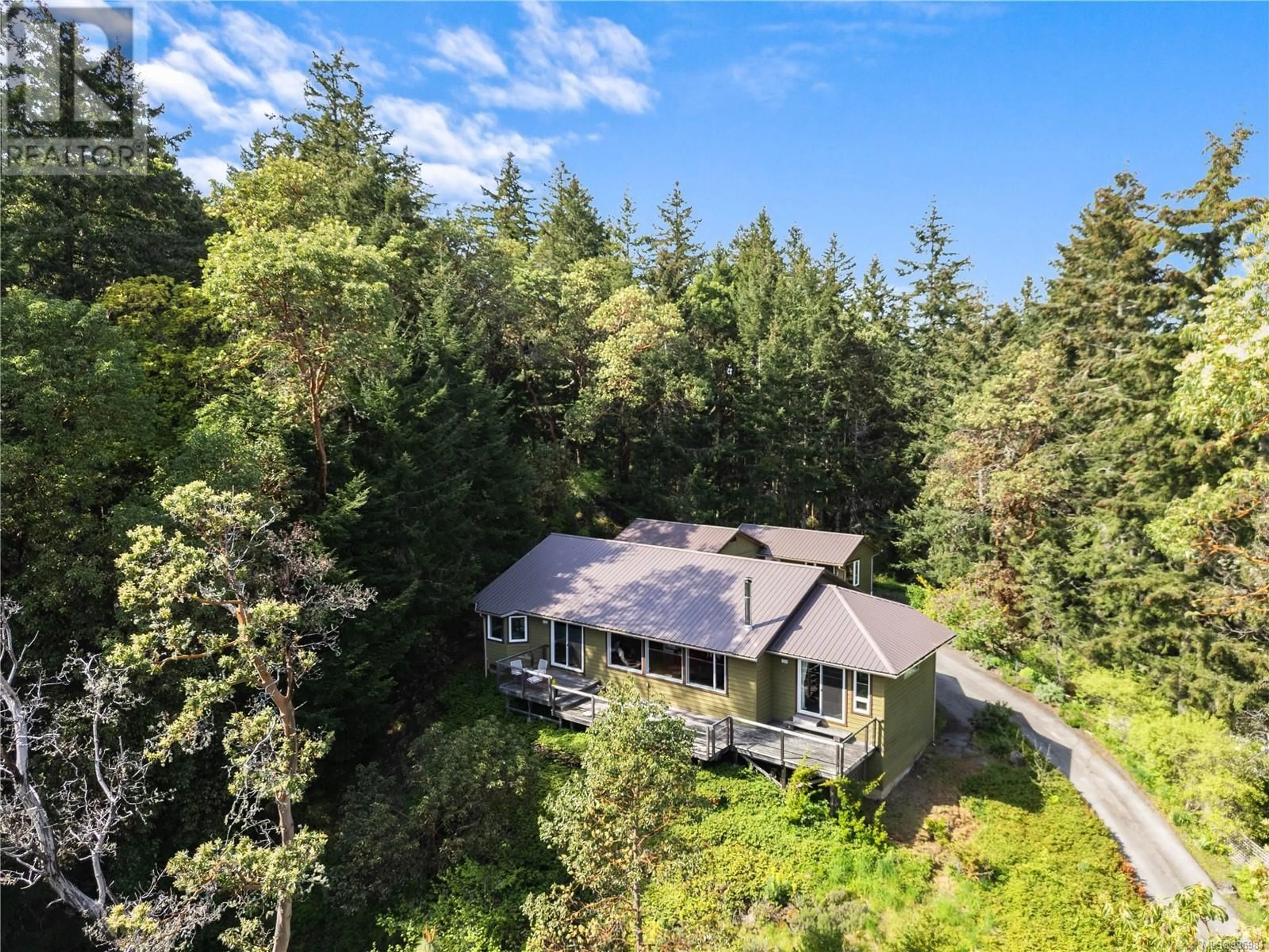A pic from outside/outdoor area/front of a property/back of a property/a pic from drone, forest/trees view for 260 OLD DIVIDE ROAD, Salt Spring British Columbia V8K2G7