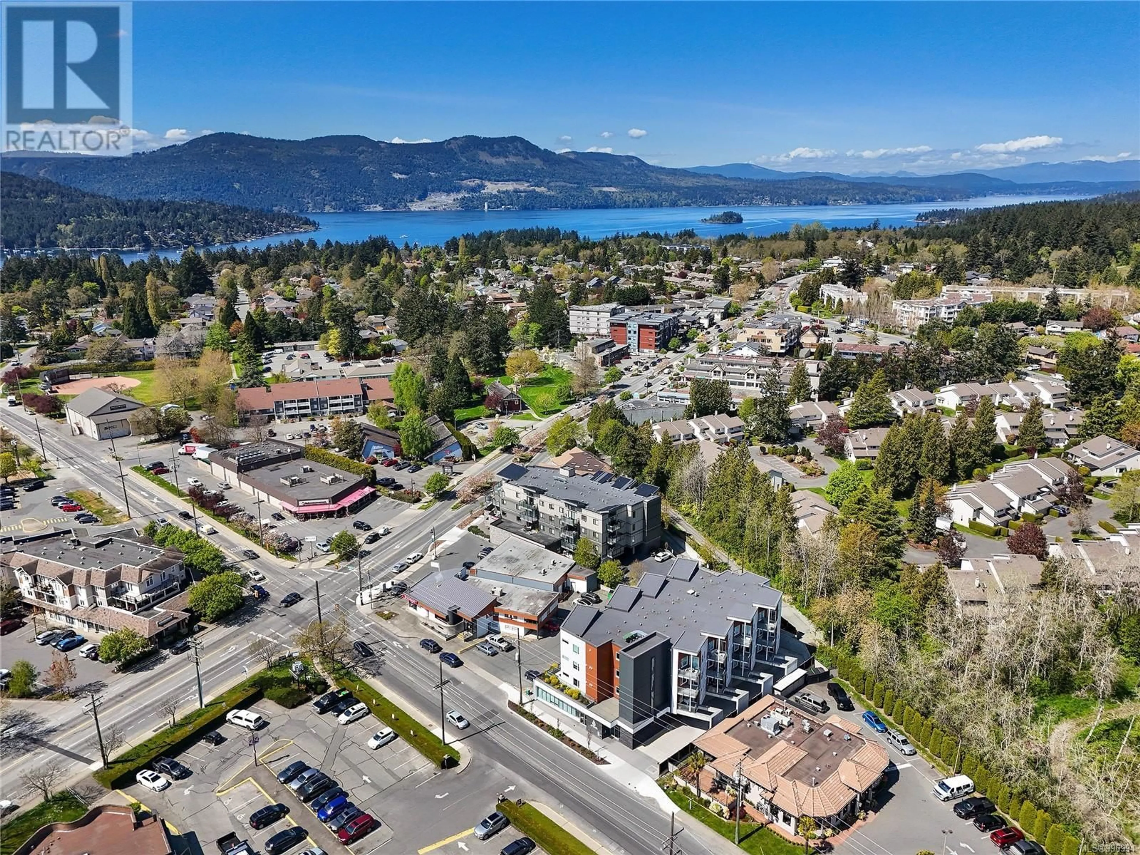 A pic from outside/outdoor area/front of a property/back of a property/a pic from drone, water/lake/river/ocean view for 302 - 7111 WEST SAANICH ROAD, Central Saanich British Columbia V8M1P7