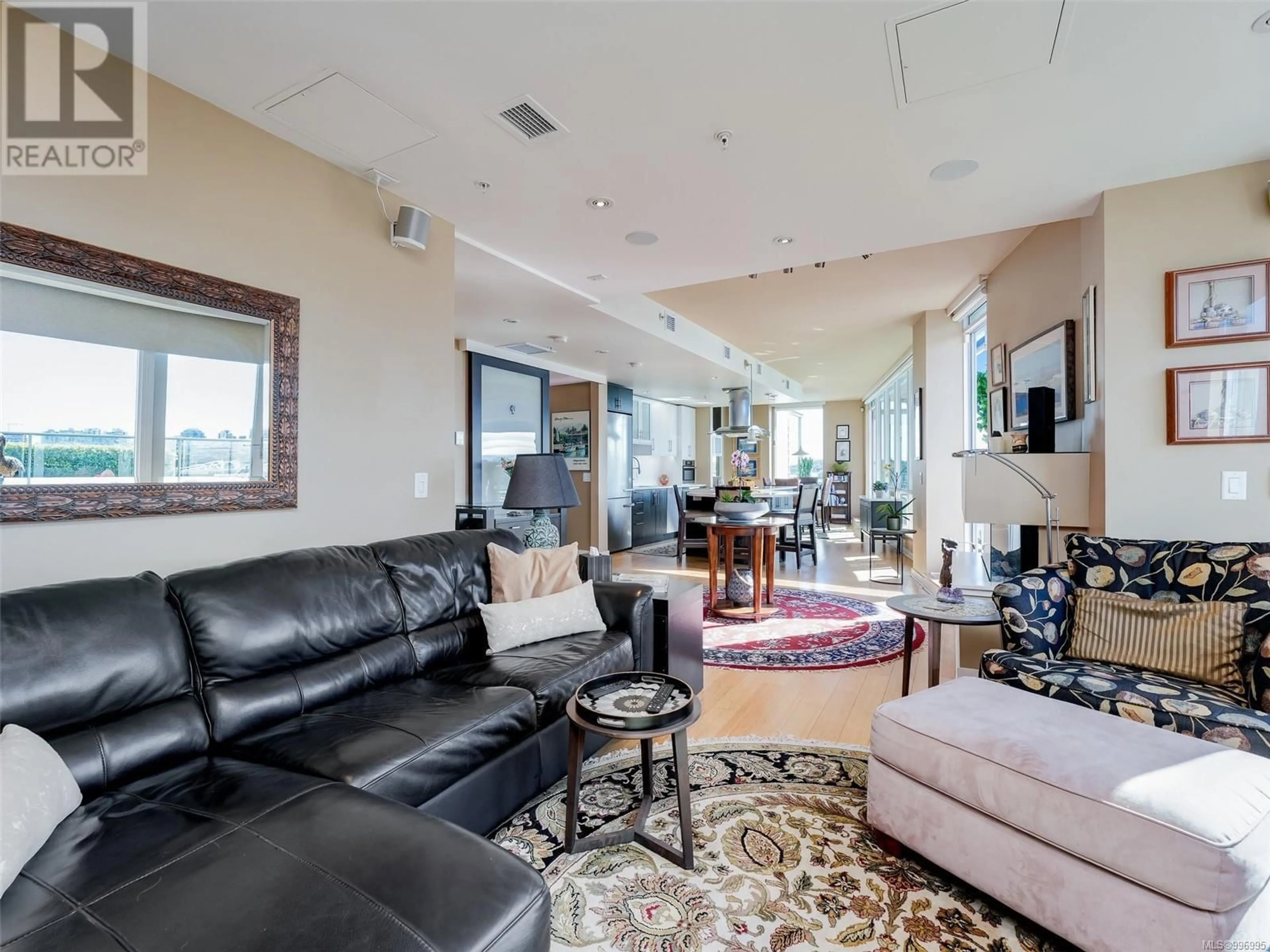 Living room with furniture, unknown for 704 - 399 TYEE ROAD, Victoria British Columbia V9A0A8