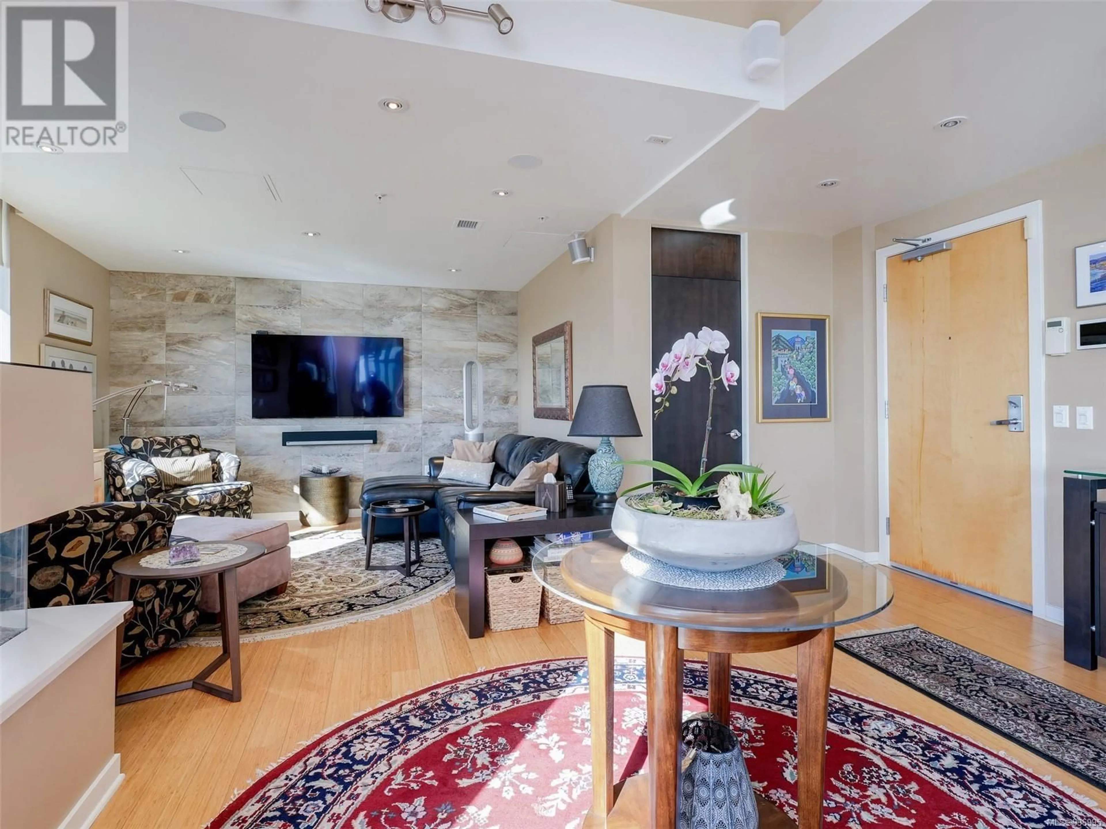 Living room with furniture, unknown for 704 - 399 TYEE ROAD, Victoria British Columbia V9A0A8