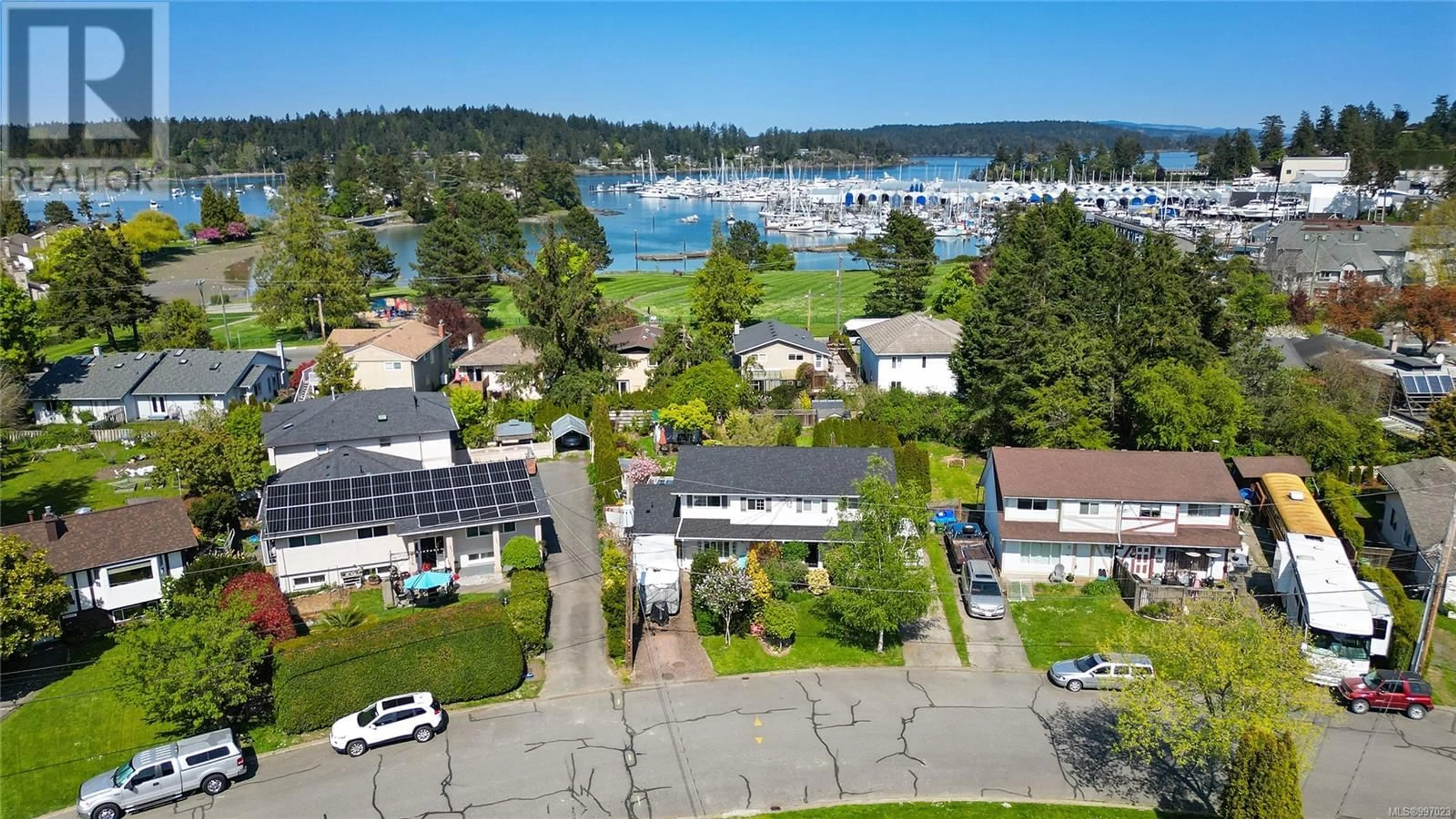A pic from outside/outdoor area/front of a property/back of a property/a pic from drone, water/lake/river/ocean view for A - 2043 COURSER DRIVE, Sidney British Columbia V8L2N5
