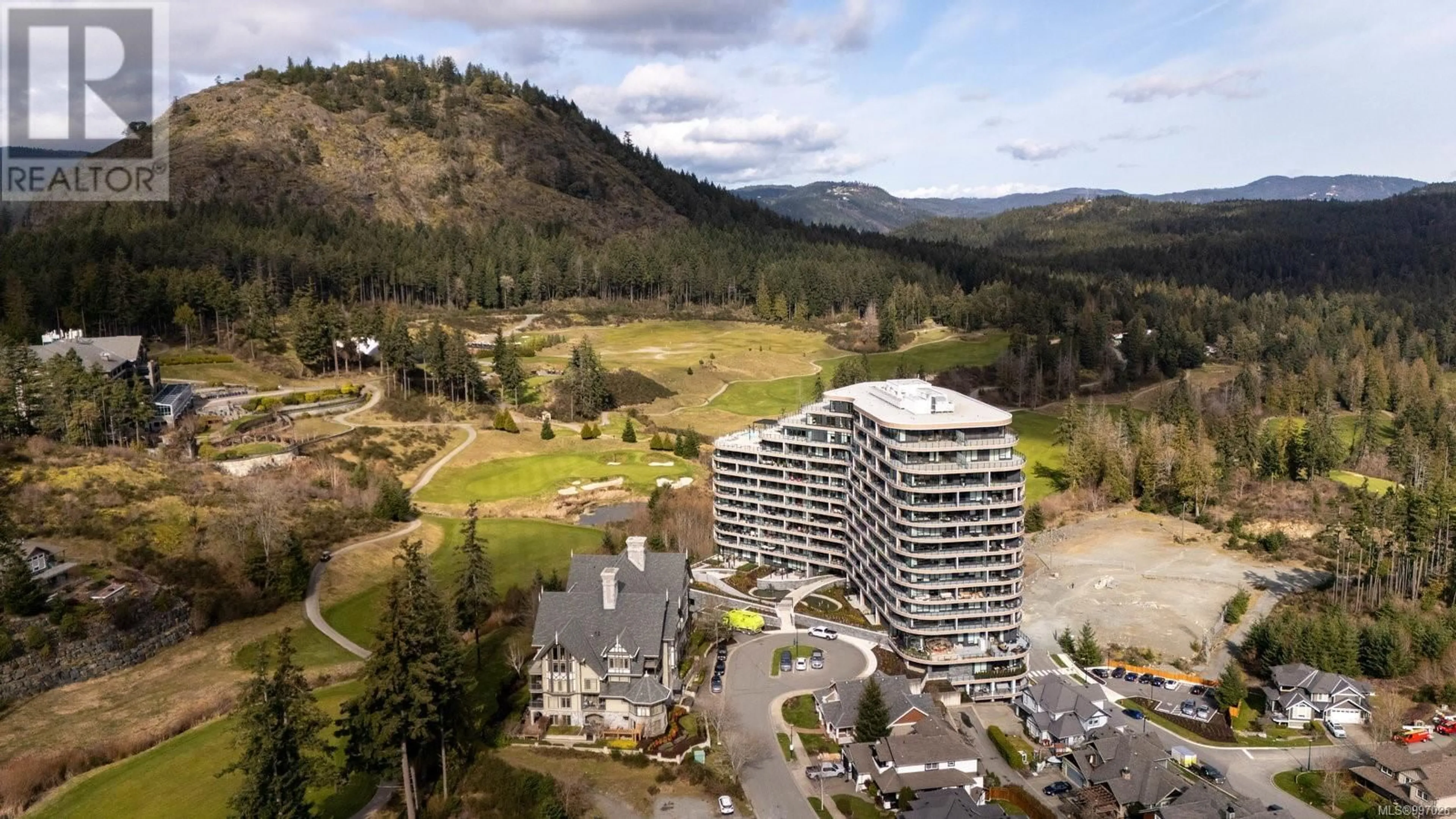 A pic from outside/outdoor area/front of a property/back of a property/a pic from drone, mountain view for 1505 - 2000 HANNINGTON ROAD, Langford British Columbia V9B7C1