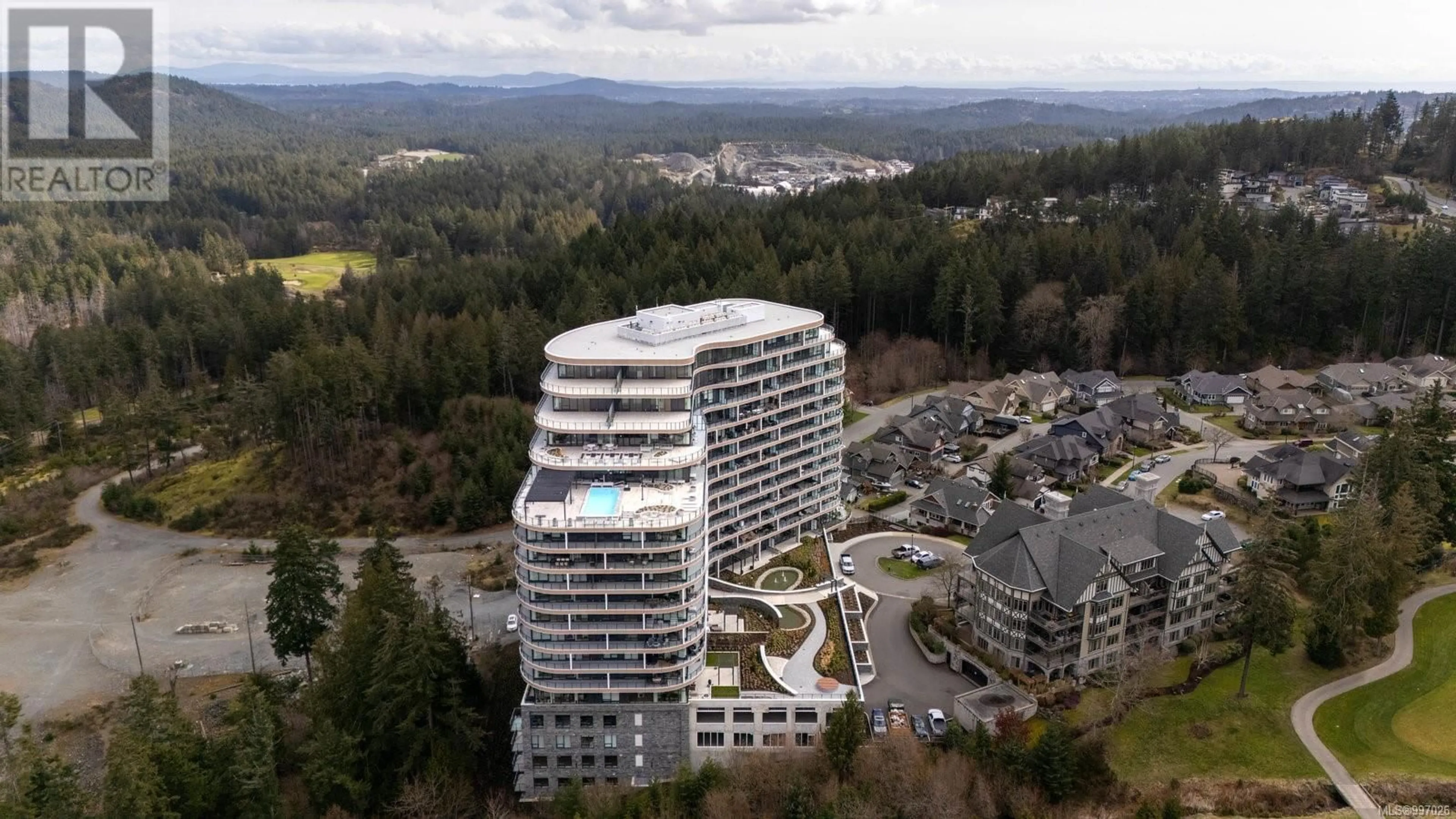 A pic from outside/outdoor area/front of a property/back of a property/a pic from drone, mountain view for 1505 - 2000 HANNINGTON ROAD, Langford British Columbia V9B7C1