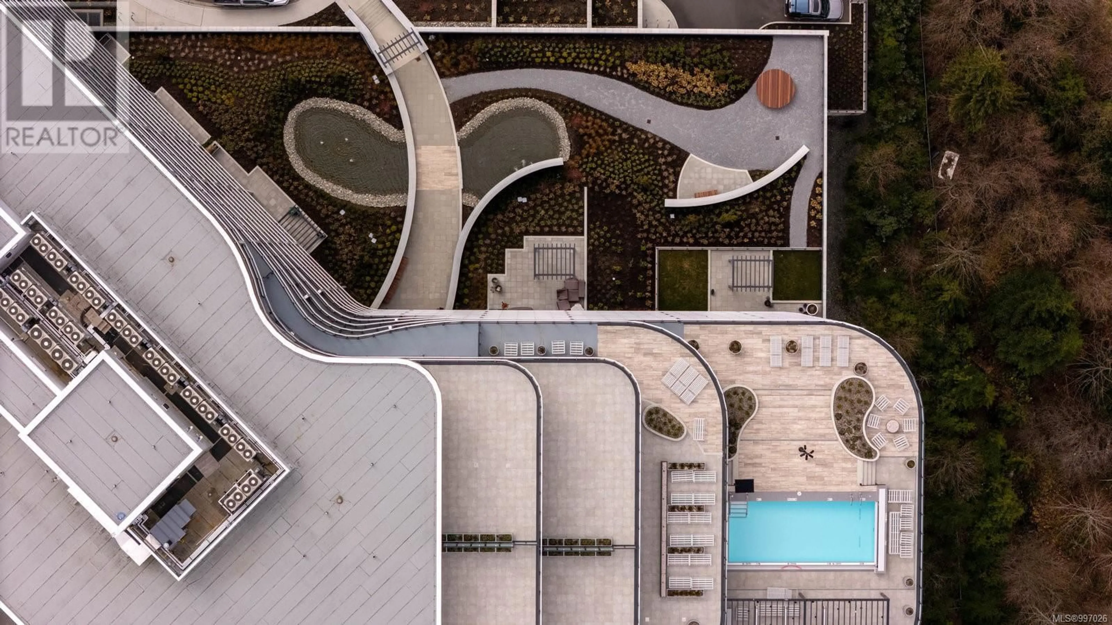 A pic from outside/outdoor area/front of a property/back of a property/a pic from drone, building for 1505 - 2000 HANNINGTON ROAD, Langford British Columbia V9B7C1