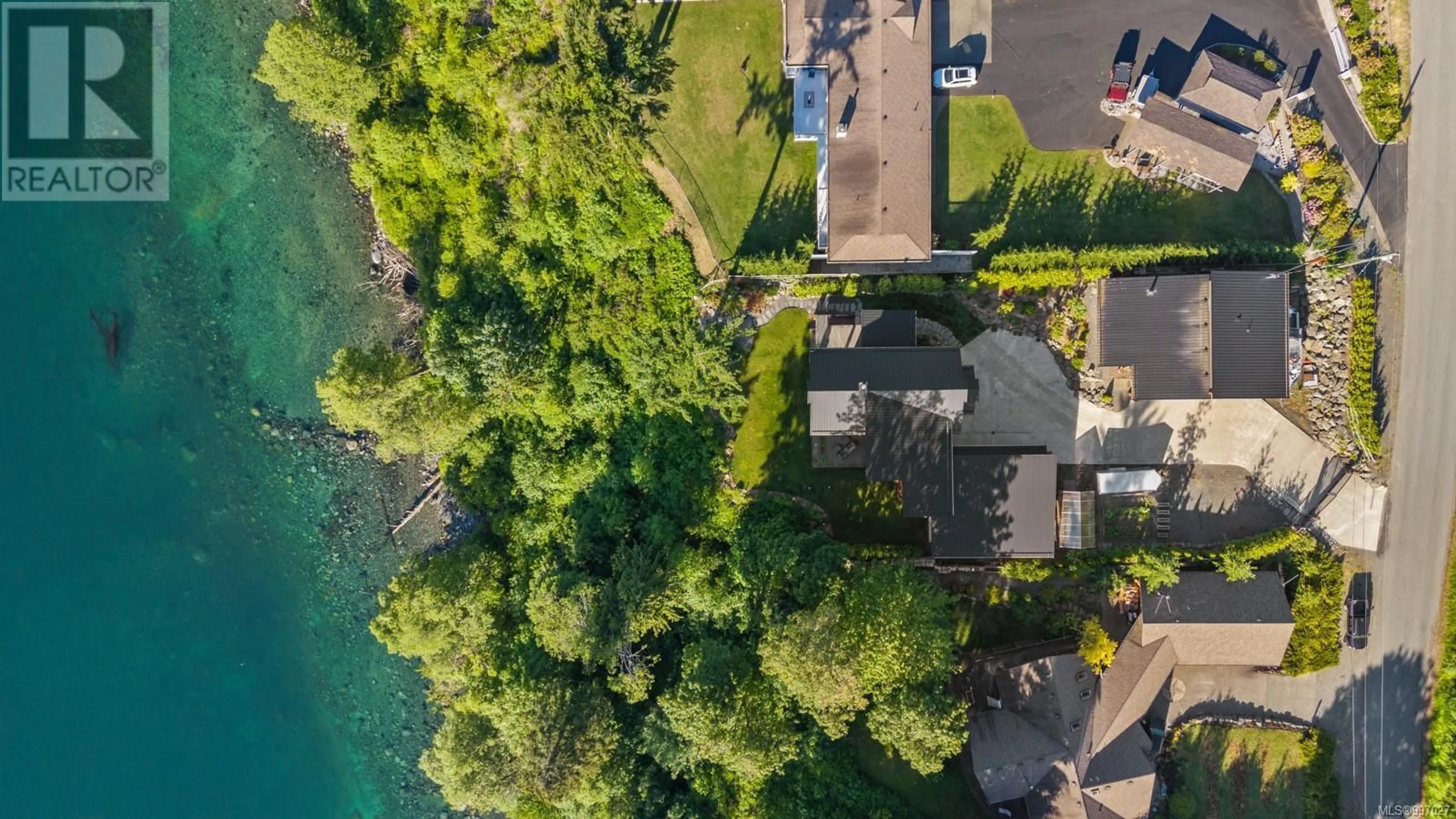 A pic from outside/outdoor area/front of a property/back of a property/a pic from drone, water/lake/river/ocean view for 5760 RACE POINT ROAD, Campbell River British Columbia V9H1N7