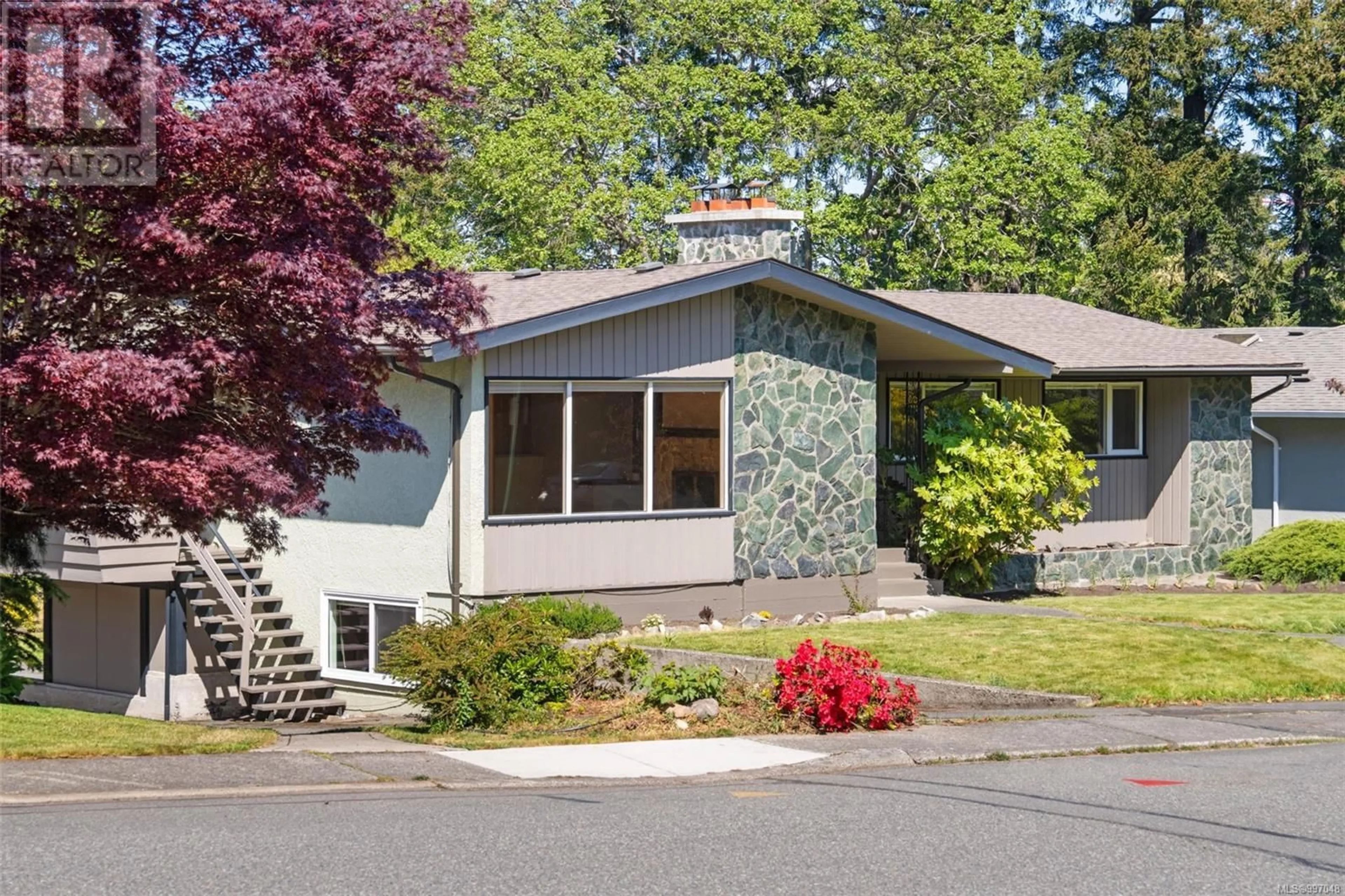 Home with vinyl exterior material, street for 2048 FREDERICK NORRIS ROAD, Oak Bay British Columbia V8P2B2
