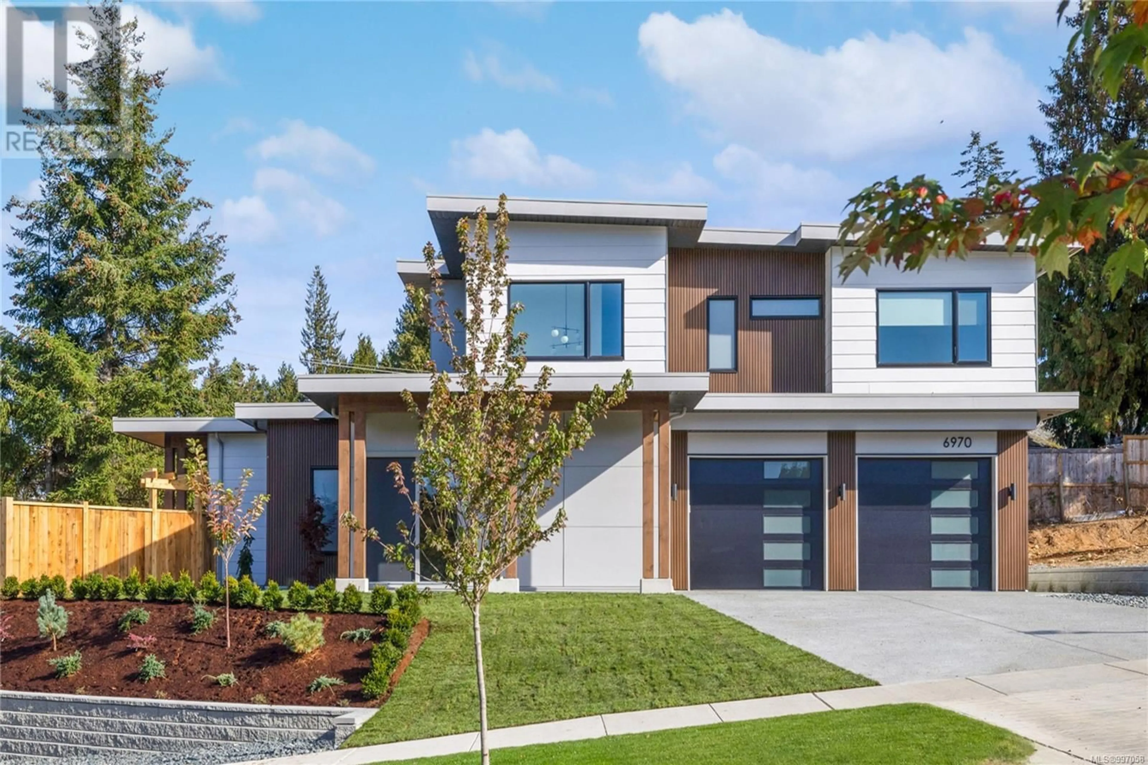 Home with brick exterior material, street for 6970 SHALE ROAD, Lantzville British Columbia V0R2H0