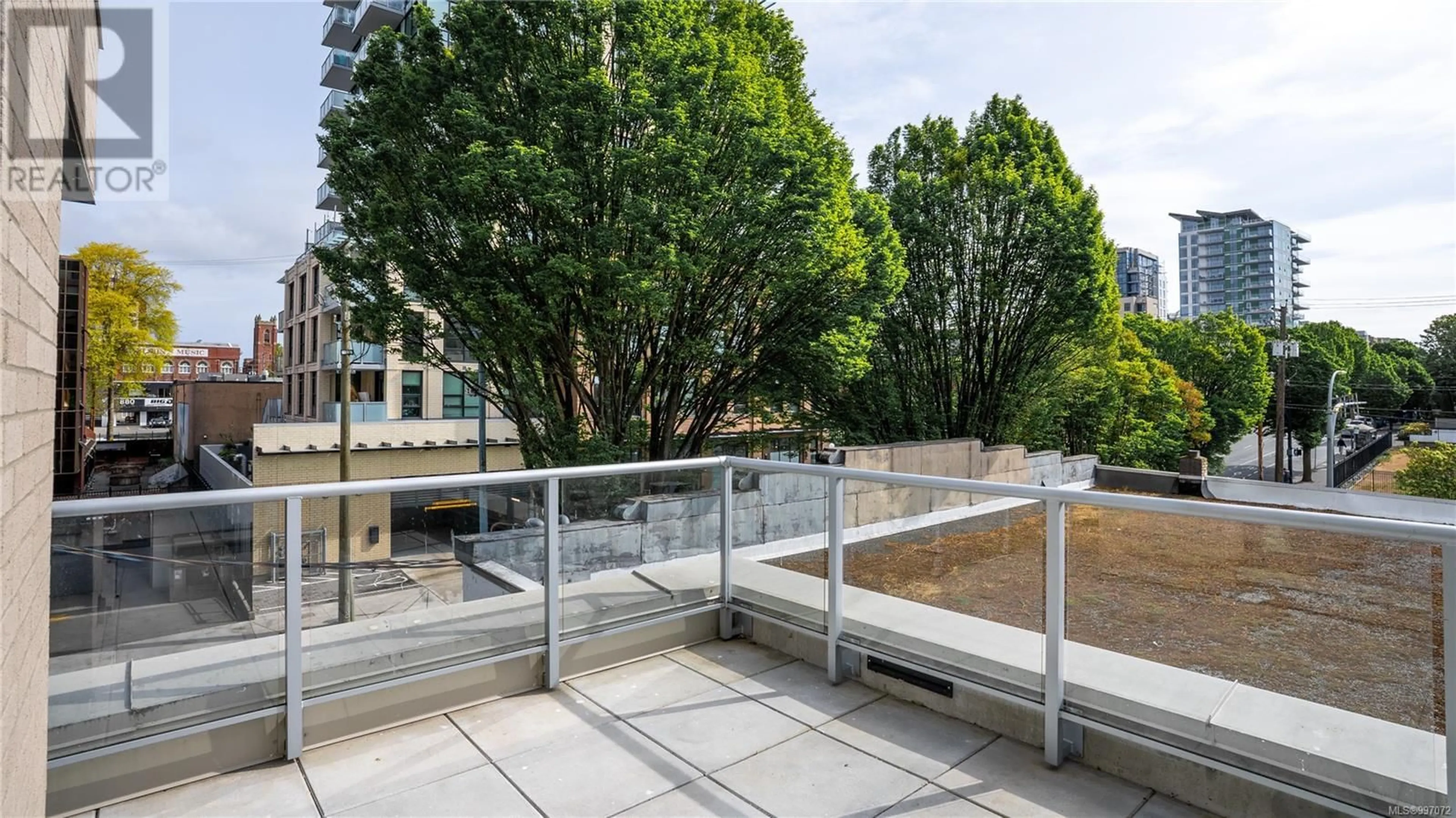 Patio, city buildings view from balcony for 302 - 845 JOHNSON STREET, Victoria British Columbia V8W0G3