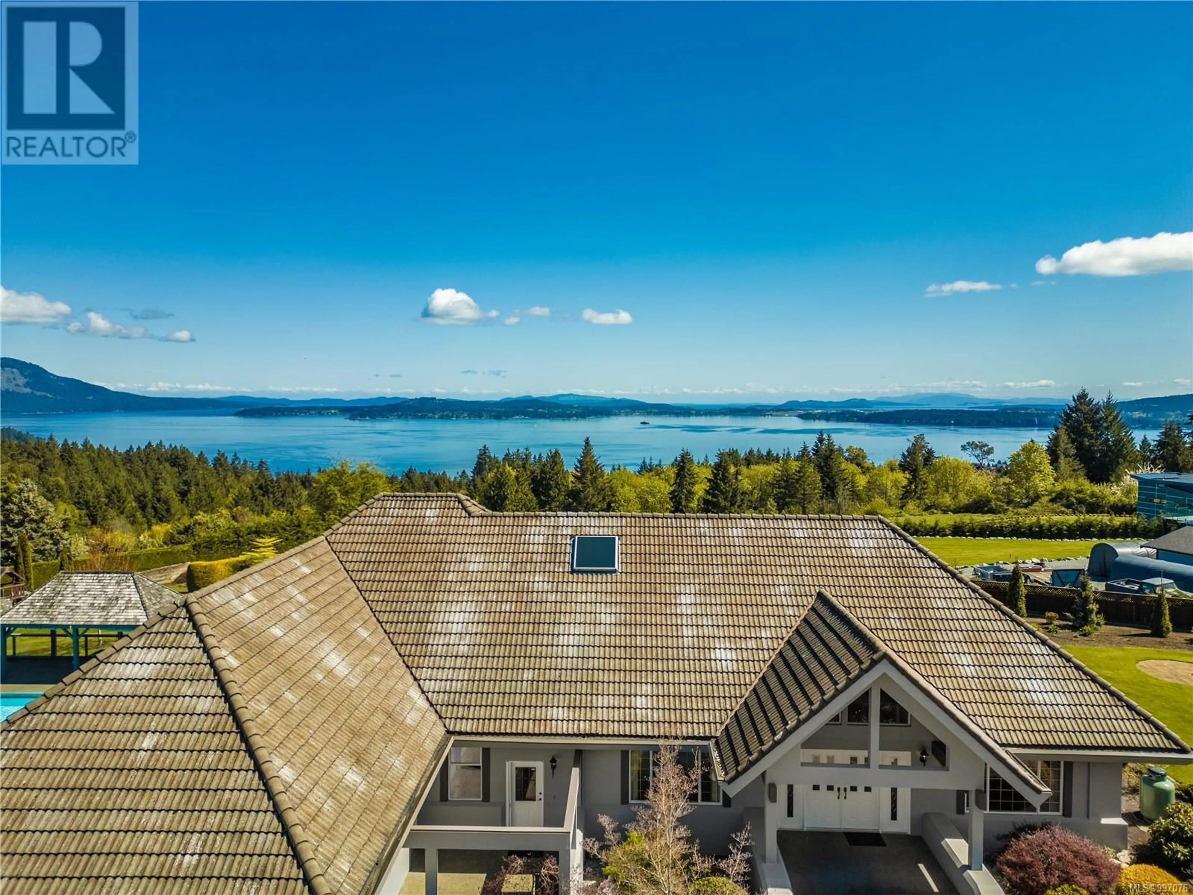A pic from outside/outdoor area/front of a property/back of a property/a pic from drone, water/lake/river/ocean view for 2321 BOULDING ROAD, Mill Bay British Columbia V0R2P0