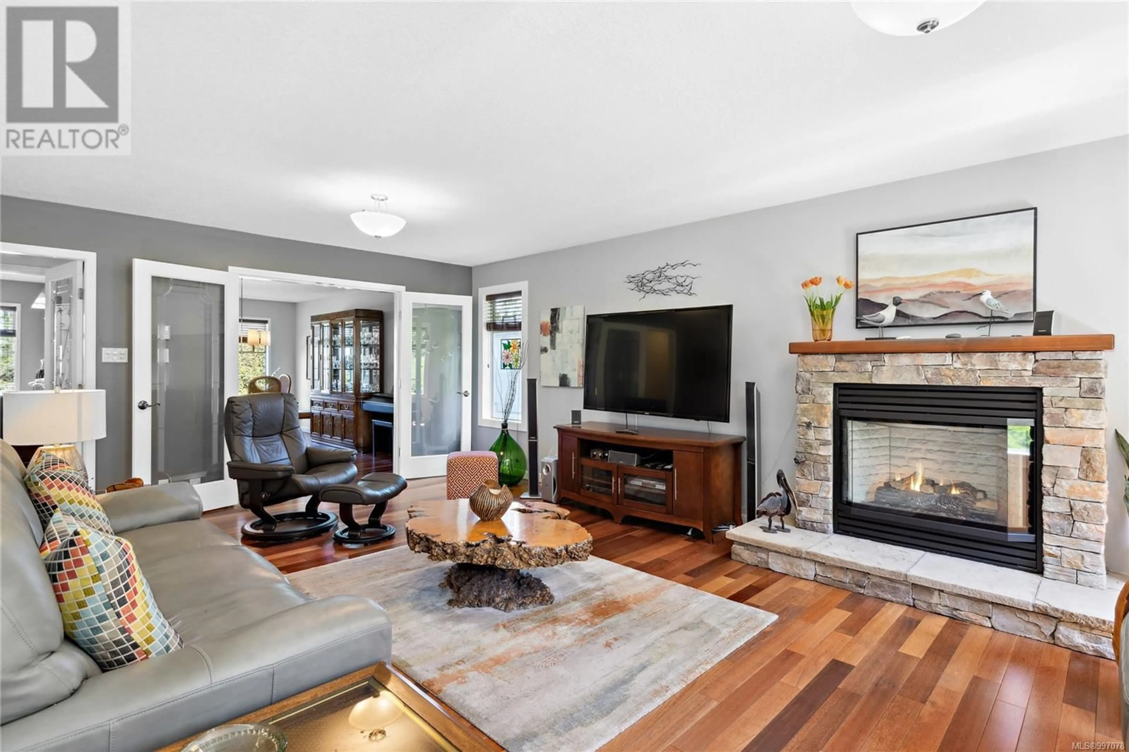 Living room with furniture, unknown for 7955 SOUTHWIND DRIVE, Lantzville British Columbia V0R2H0