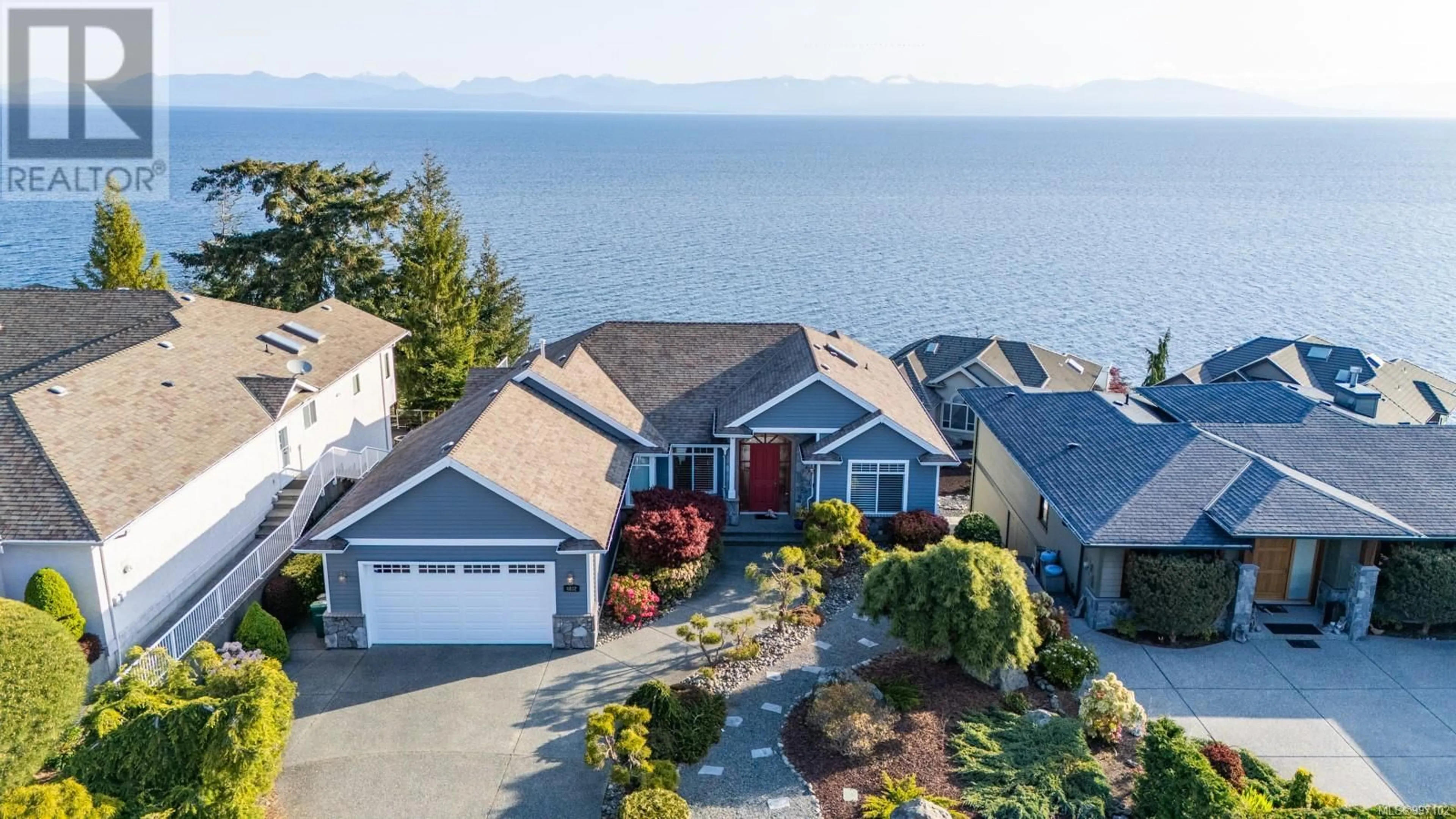 A pic from outside/outdoor area/front of a property/back of a property/a pic from drone, water/lake/river/ocean view for 4832 FILLINGER CRESCENT, Nanaimo British Columbia V9V1K1