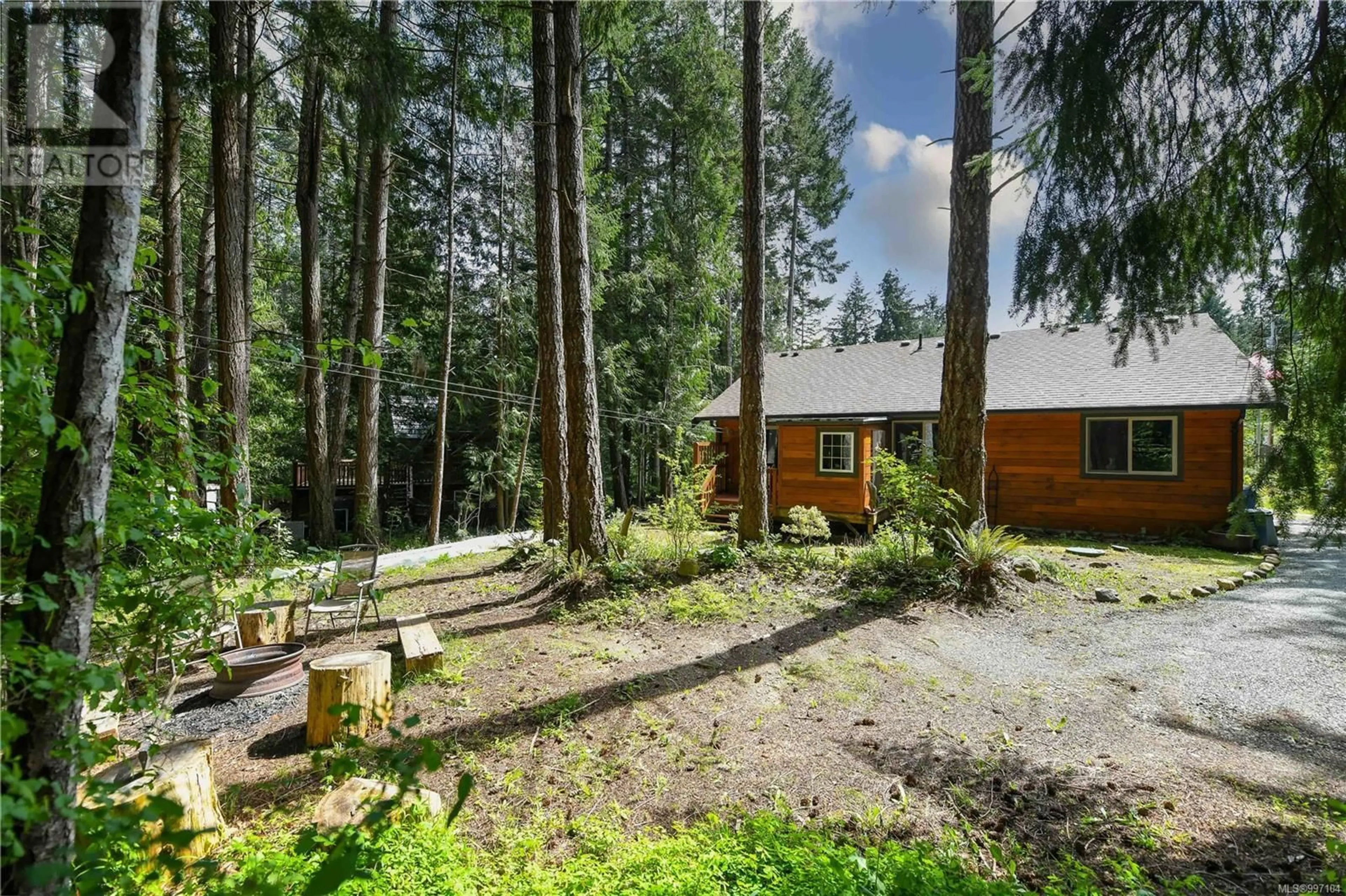 A pic from outside/outdoor area/front of a property/back of a property/a pic from drone, forest/trees view for 7895 SHIPS POINT ROAD, Fanny Bay British Columbia V0R1W0