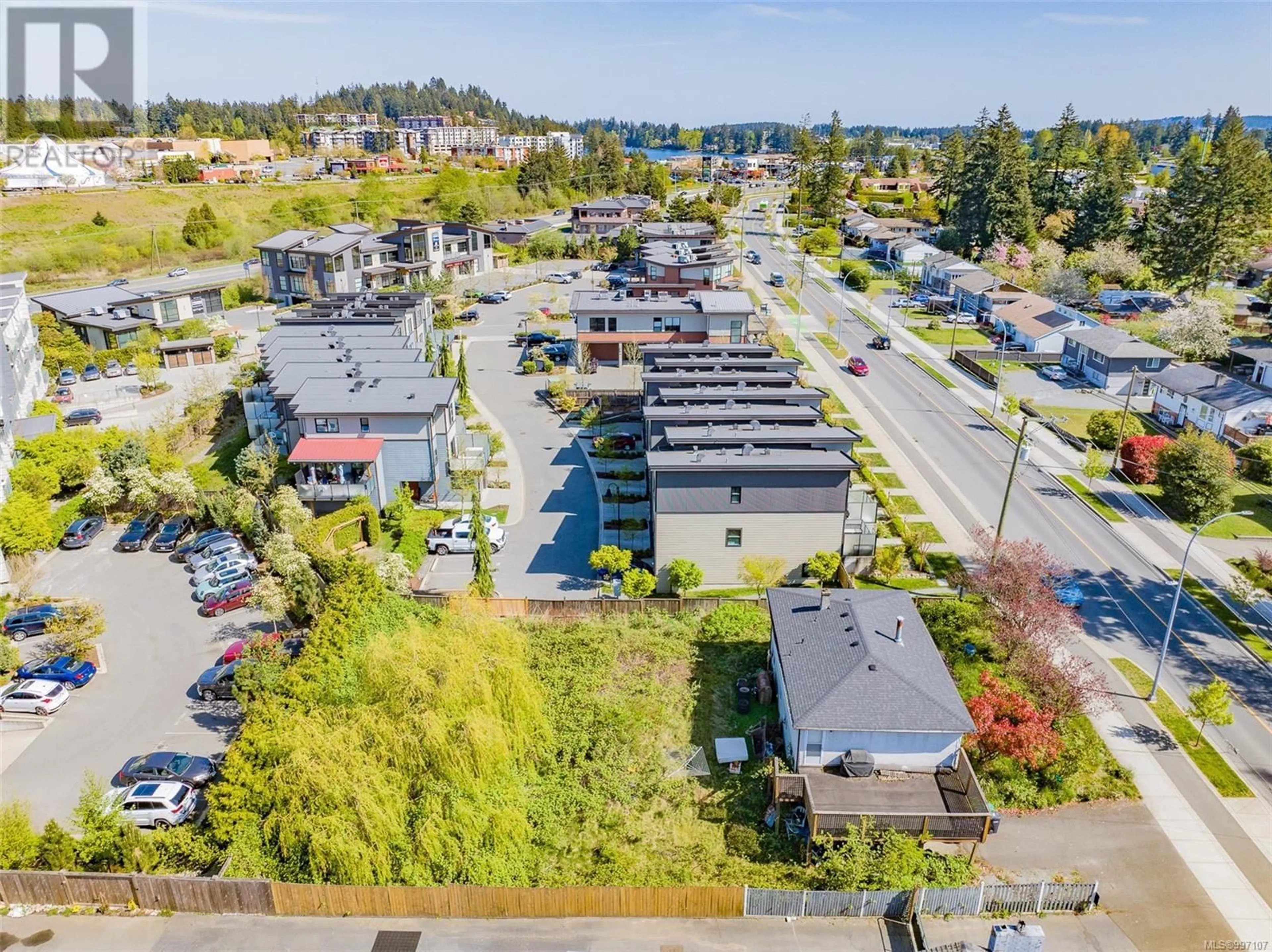 A pic from outside/outdoor area/front of a property/back of a property/a pic from drone, street for 5280 METRAL DRIVE, Nanaimo British Columbia V9T2K8