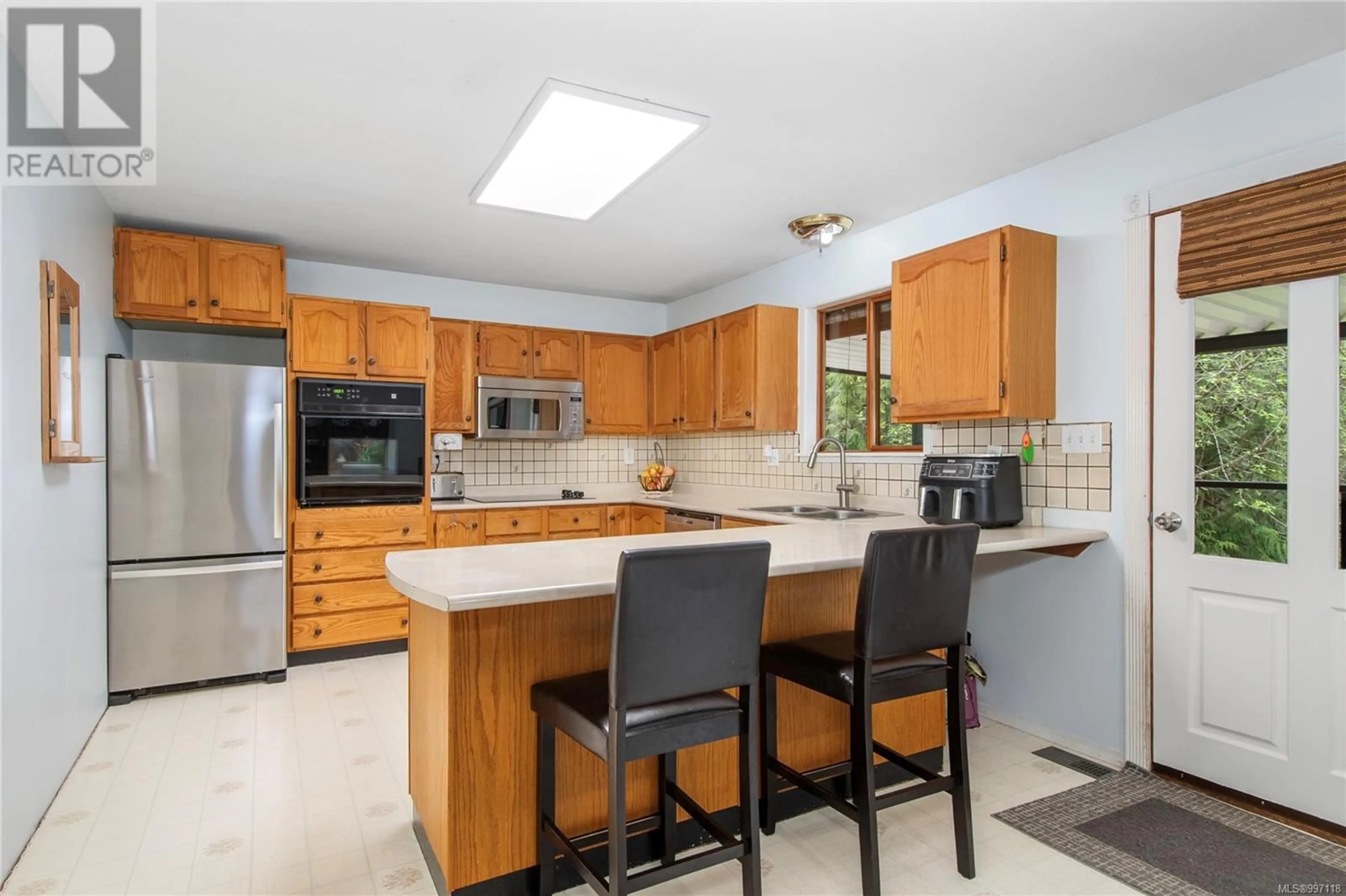 Open concept kitchen, ceramic/tile floor for 4255 FORBIDDEN PLATEAU ROAD, Courtenay British Columbia V9J1R1