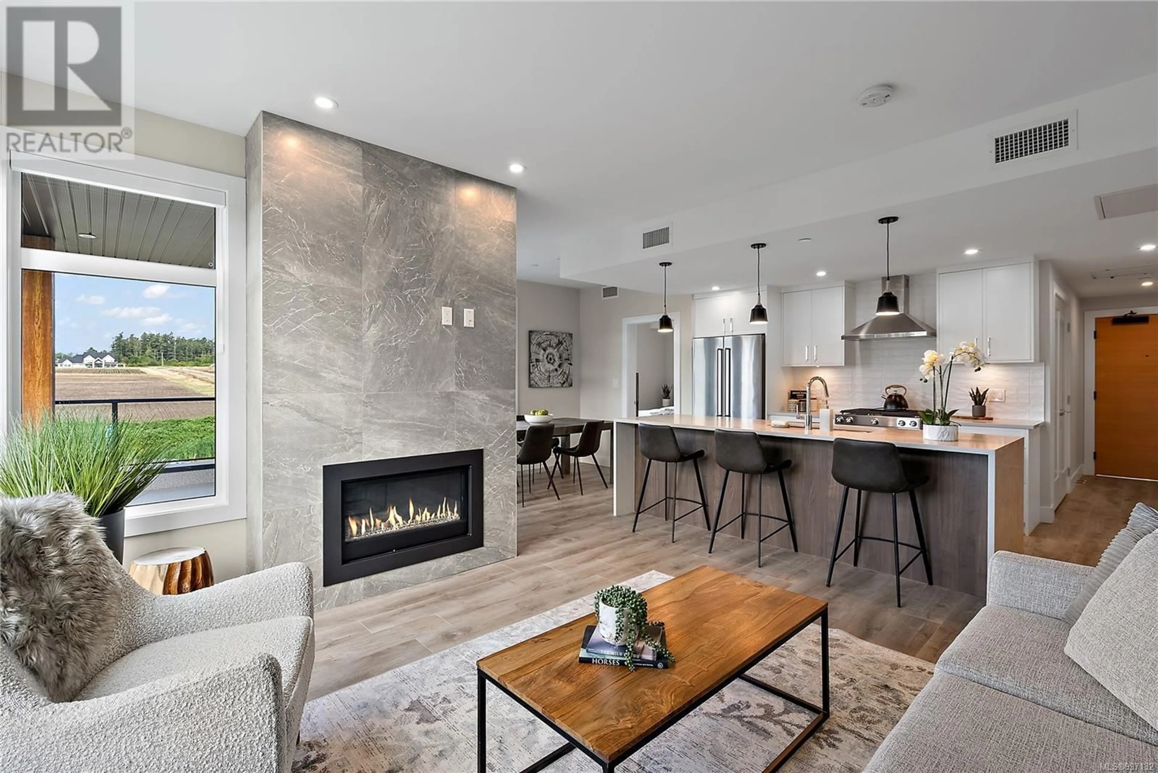 Open concept kitchen, ceramic/tile floor for 604 - 2520 HACKETT CRESCENT, Central Saanich British Columbia V8M0B9