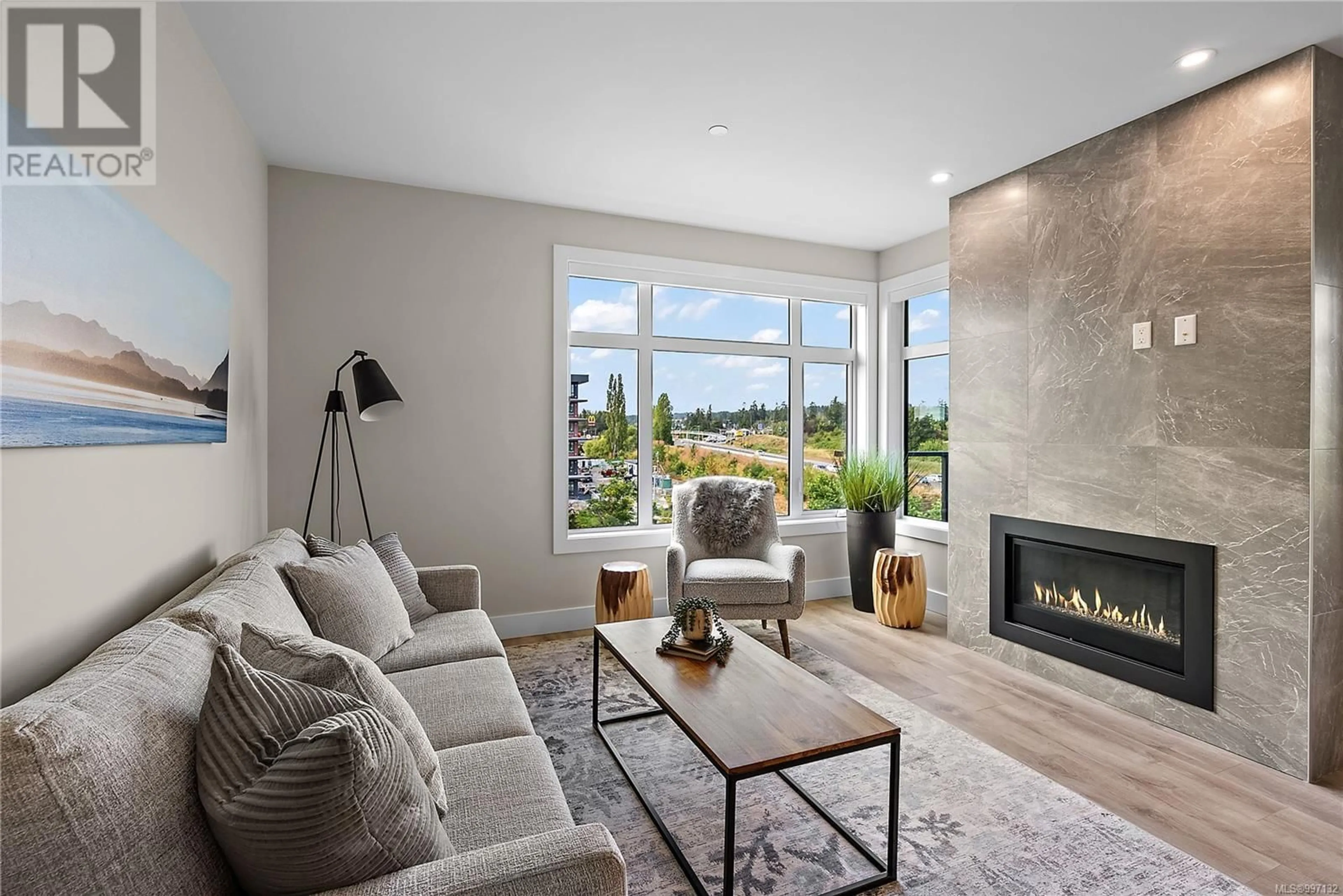 Living room with furniture, unknown for 604 - 2520 HACKETT CRESCENT, Central Saanich British Columbia V8M0B9