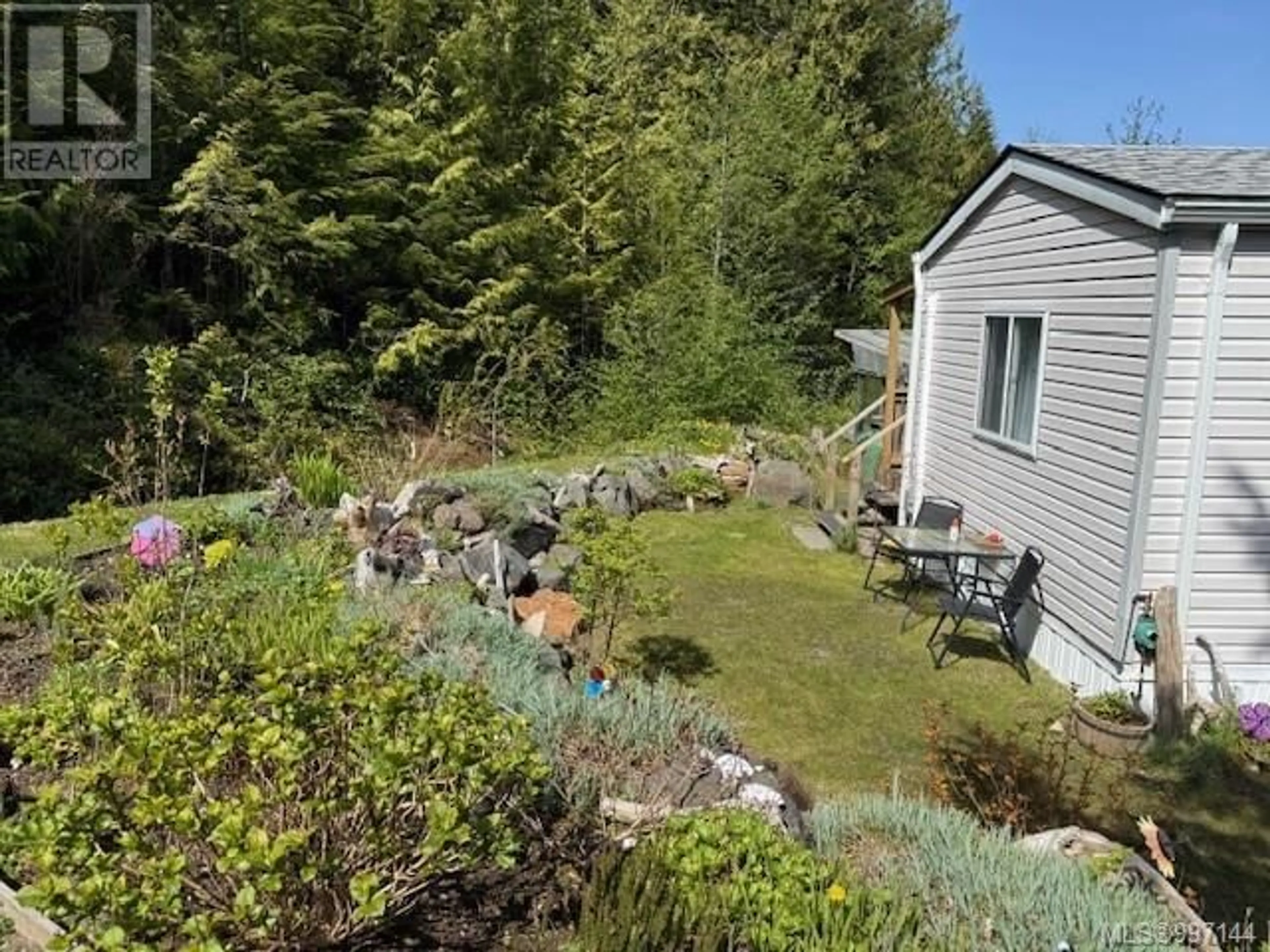 A pic from outside/outdoor area/front of a property/back of a property/a pic from drone, unknown for 34 - 5250 BEAVER HARBOUR ROAD, Port Hardy British Columbia V0N2P0