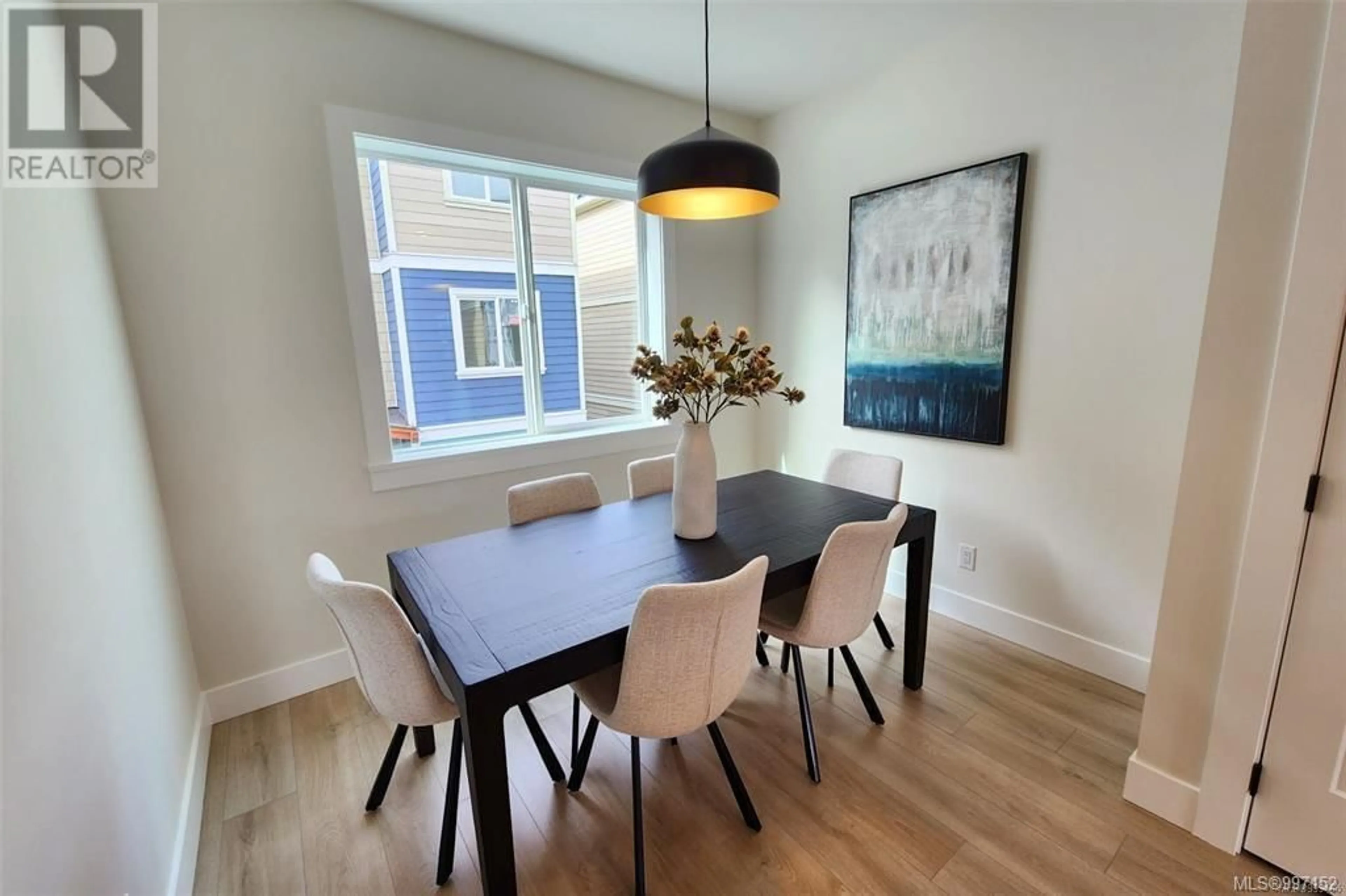 Dining room, wood/laminate floor for 1006 OCEANSPRAY COURT, Langford British Columbia V9C2V8