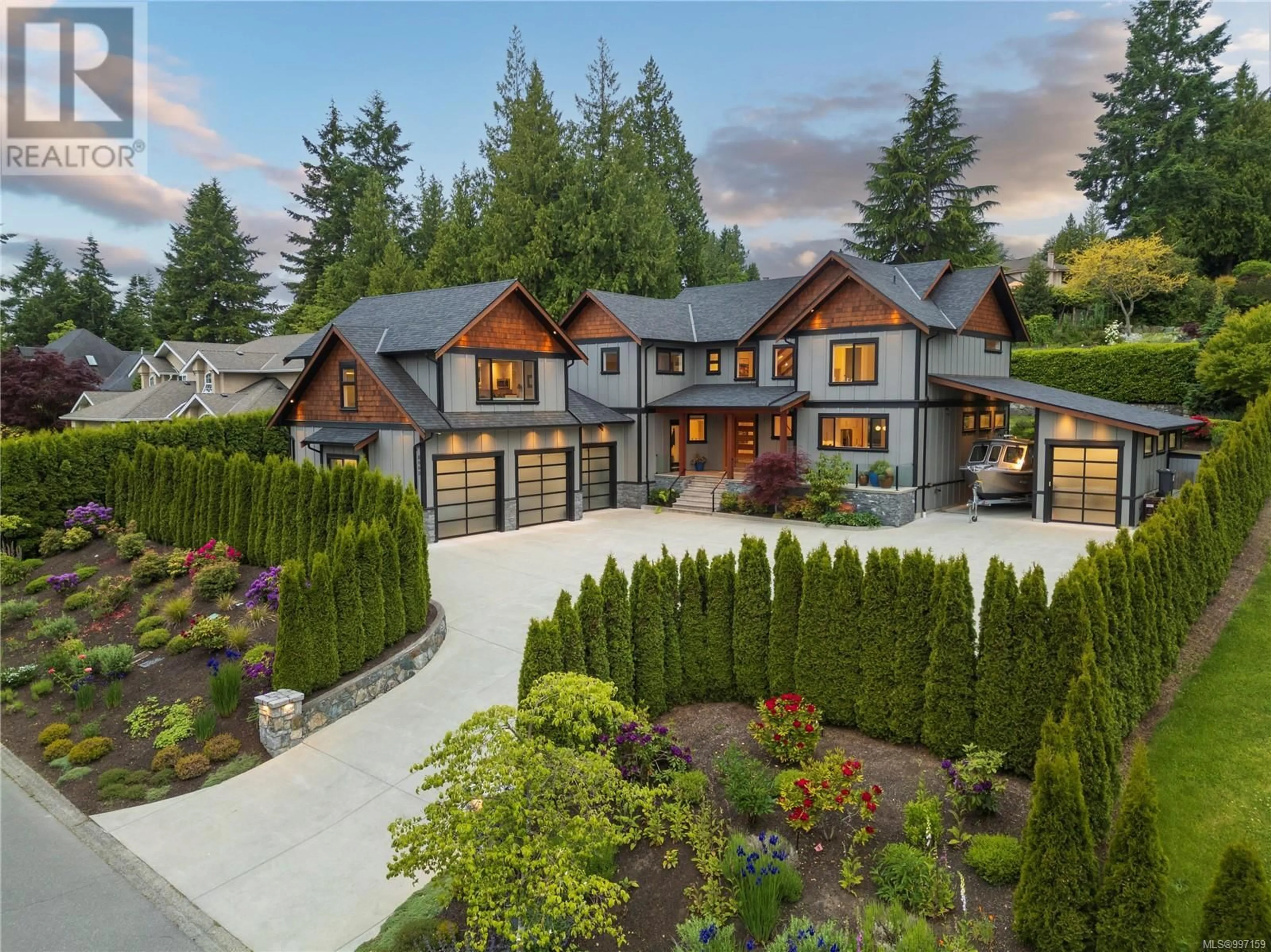Home with brick exterior material, mountain view for 8660 RICHLAND PLACE, North Saanich British Columbia V8L5E3