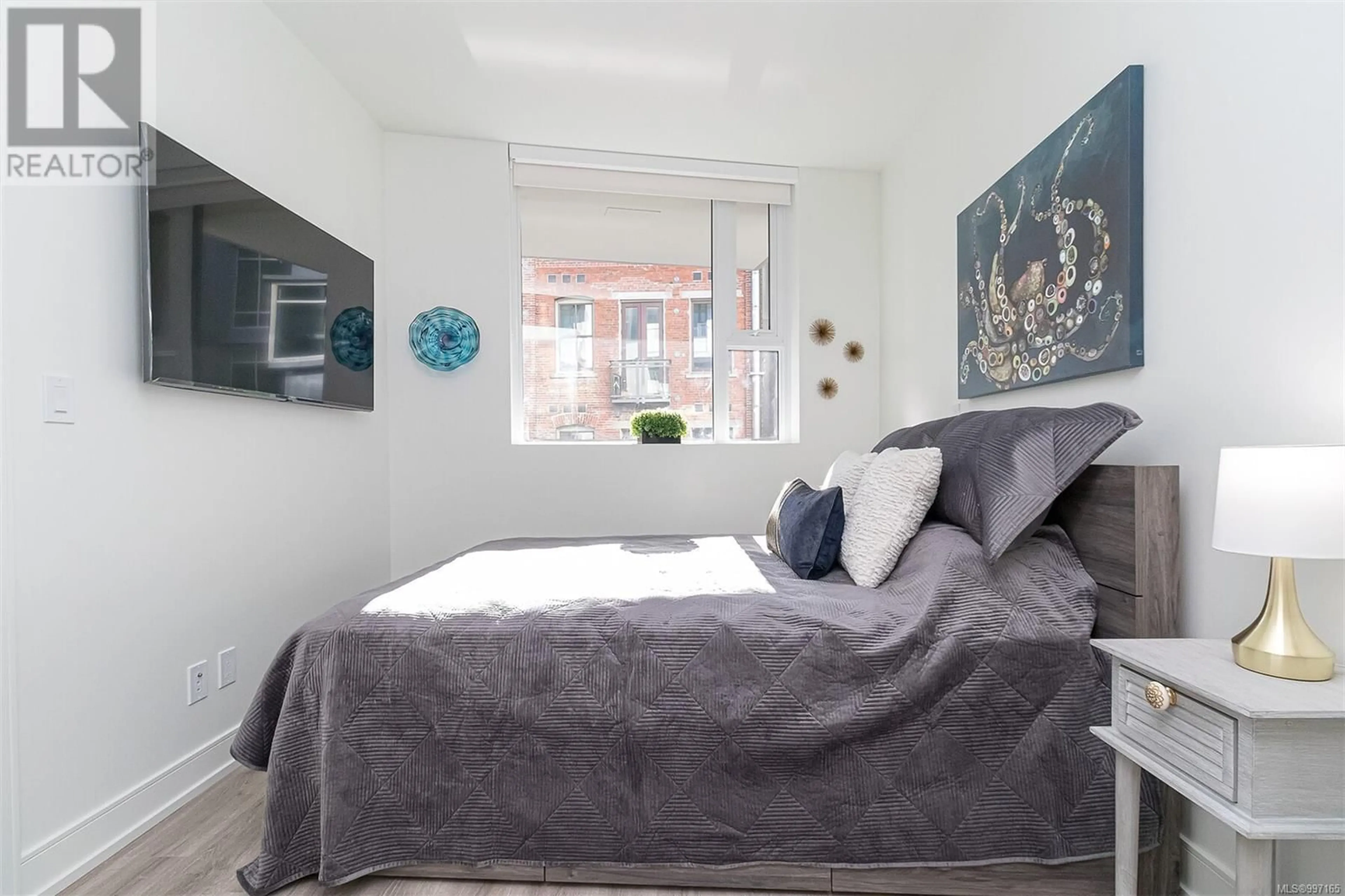 Bedroom with bed, unknown for 610 - 1628 STORE STREET, Victoria British Columbia V8W3K3