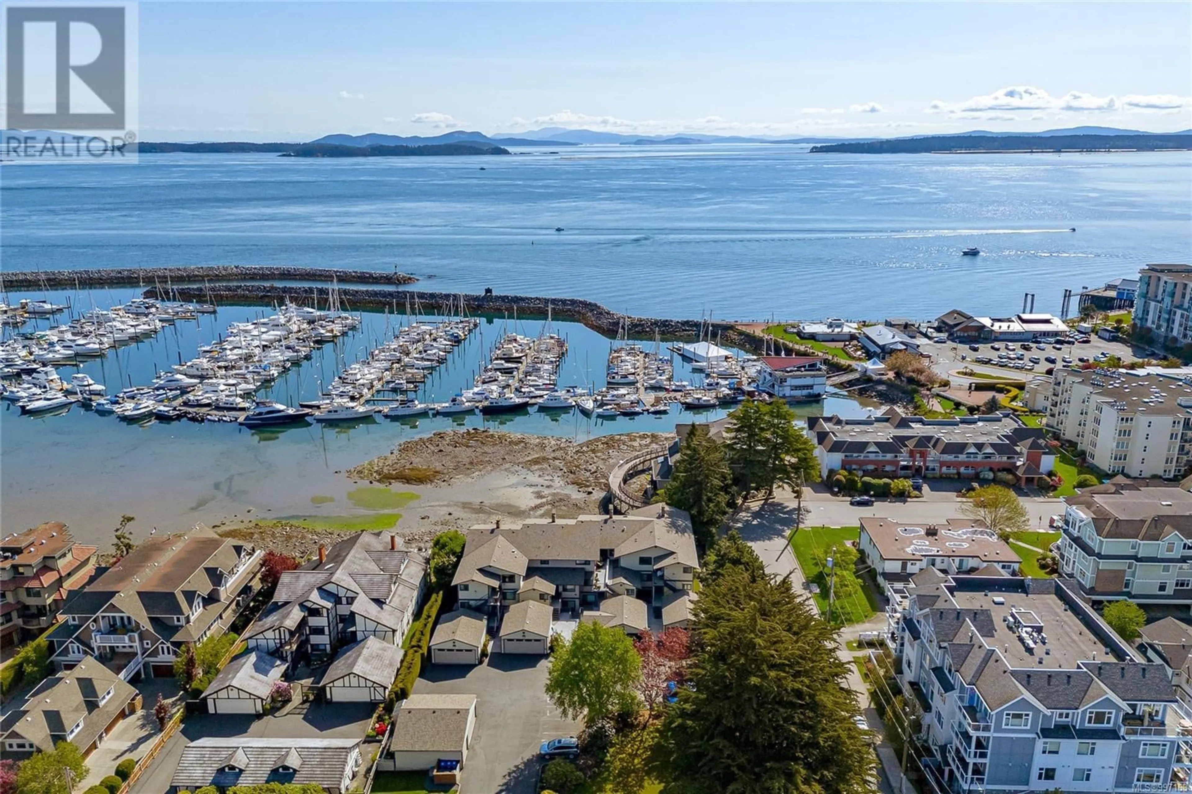 A pic from outside/outdoor area/front of a property/back of a property/a pic from drone, water/lake/river/ocean view for 7 - 9901 THIRD STREET, Sidney British Columbia V8L3B1