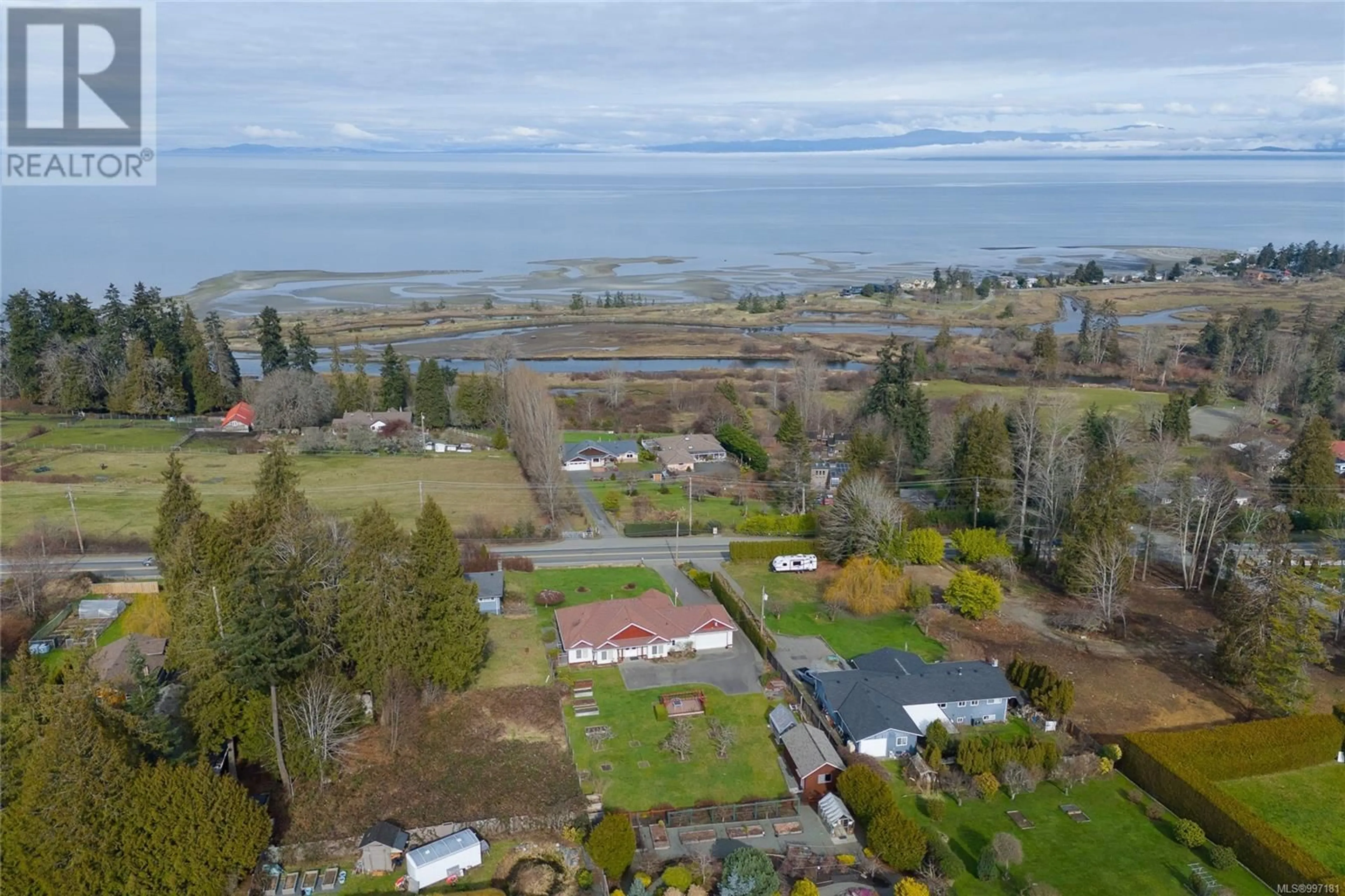 A pic from outside/outdoor area/front of a property/back of a property/a pic from drone, water/lake/river/ocean view for 3790 ISLAND HIGHWAY WEST, Qualicum Beach British Columbia V9K2C7