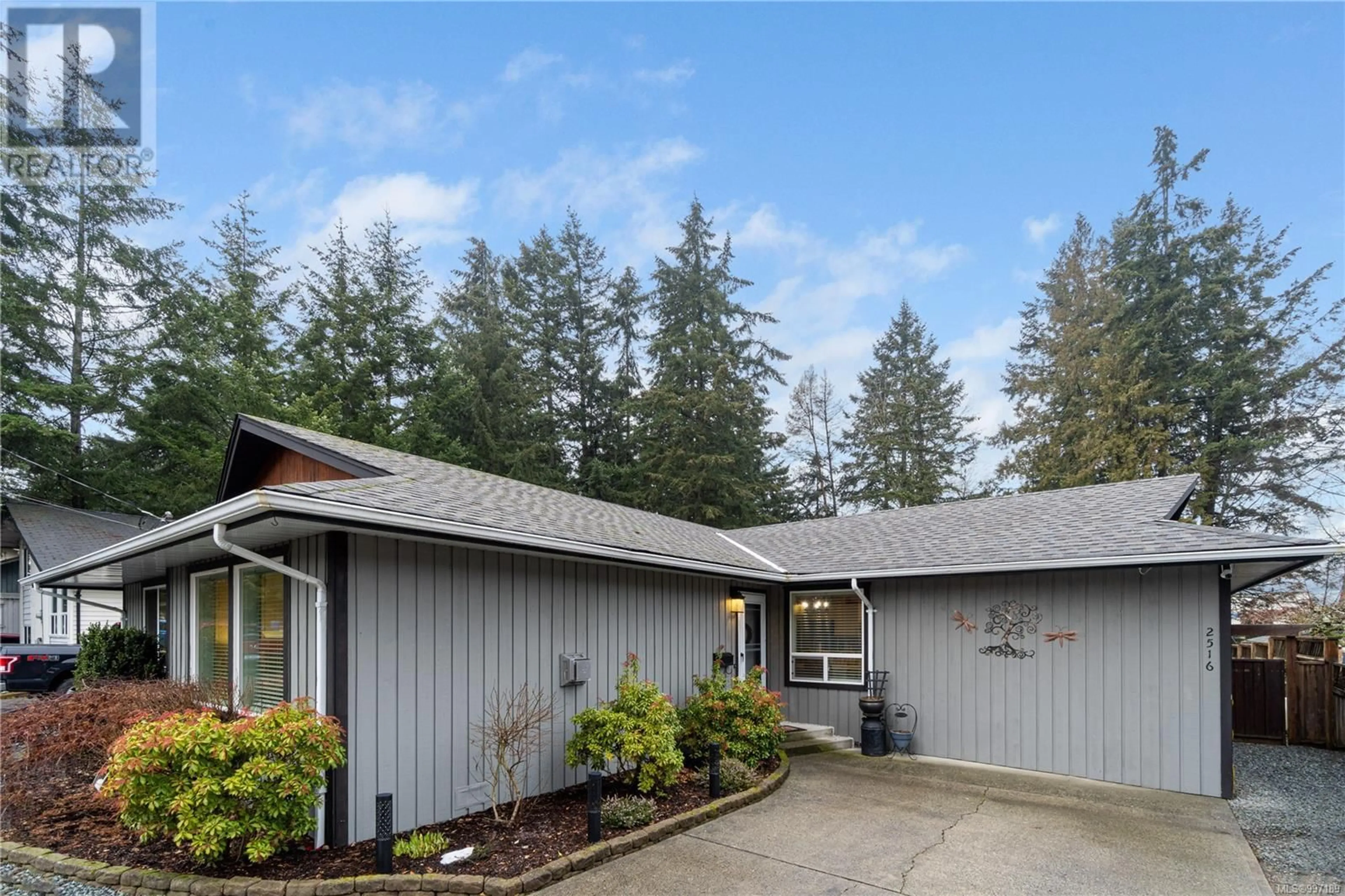 Home with vinyl exterior material, street for 2516 LABIEUX ROAD, Nanaimo British Columbia V9T4L7