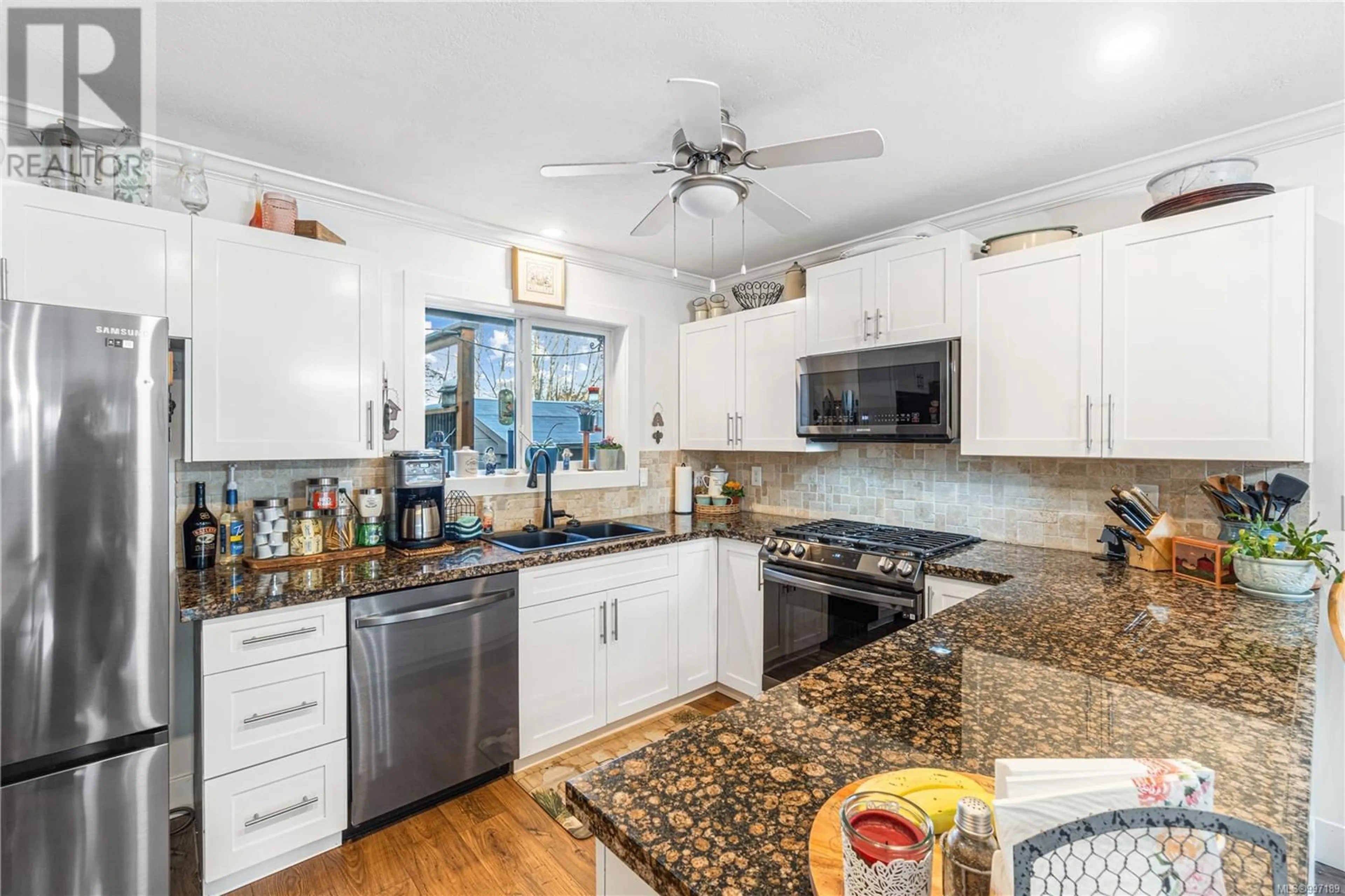 Open concept kitchen, ceramic/tile floor for 2516 LABIEUX ROAD, Nanaimo British Columbia V9T4L7