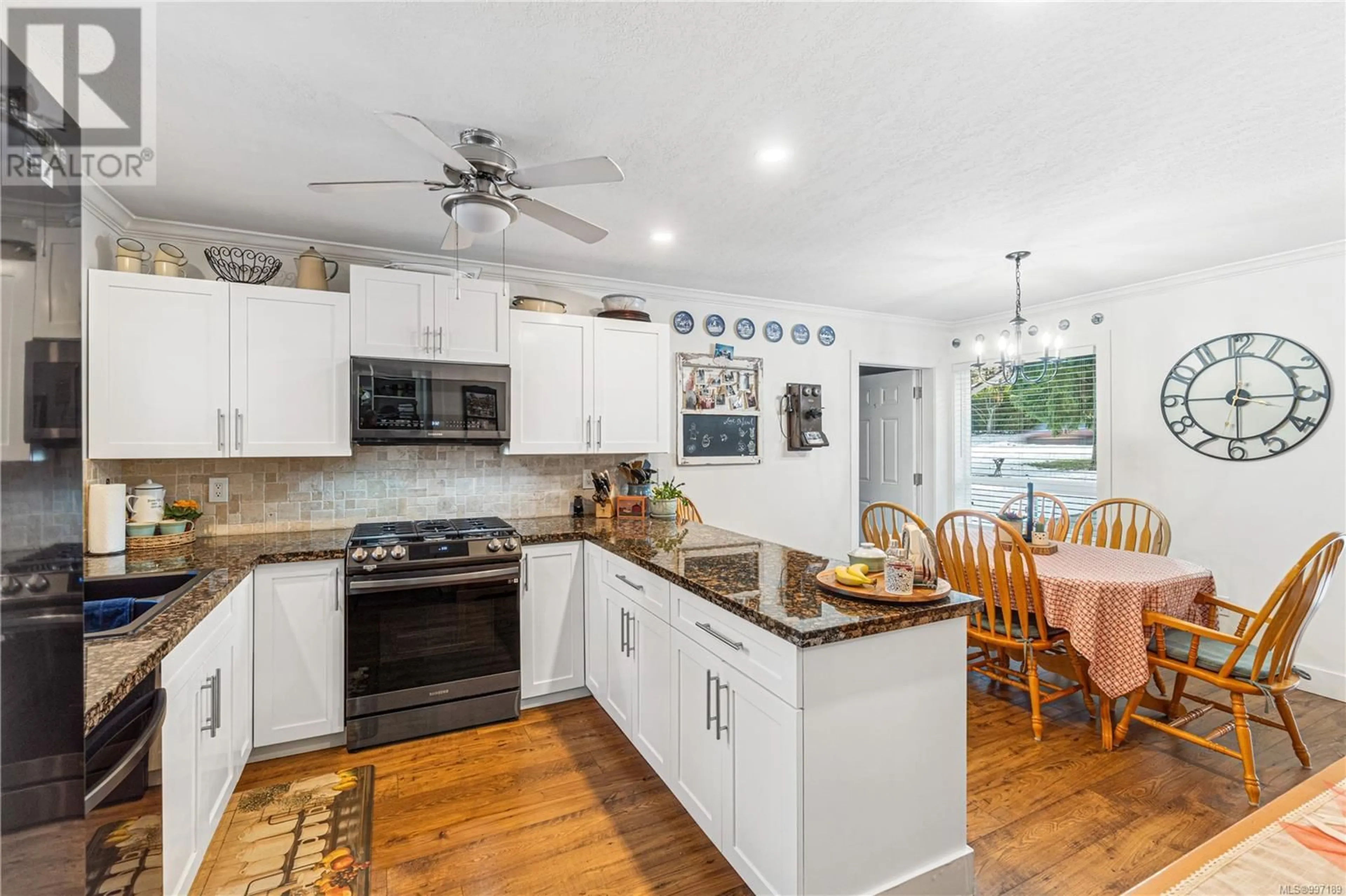 Open concept kitchen, ceramic/tile floor for 2516 LABIEUX ROAD, Nanaimo British Columbia V9T4L7