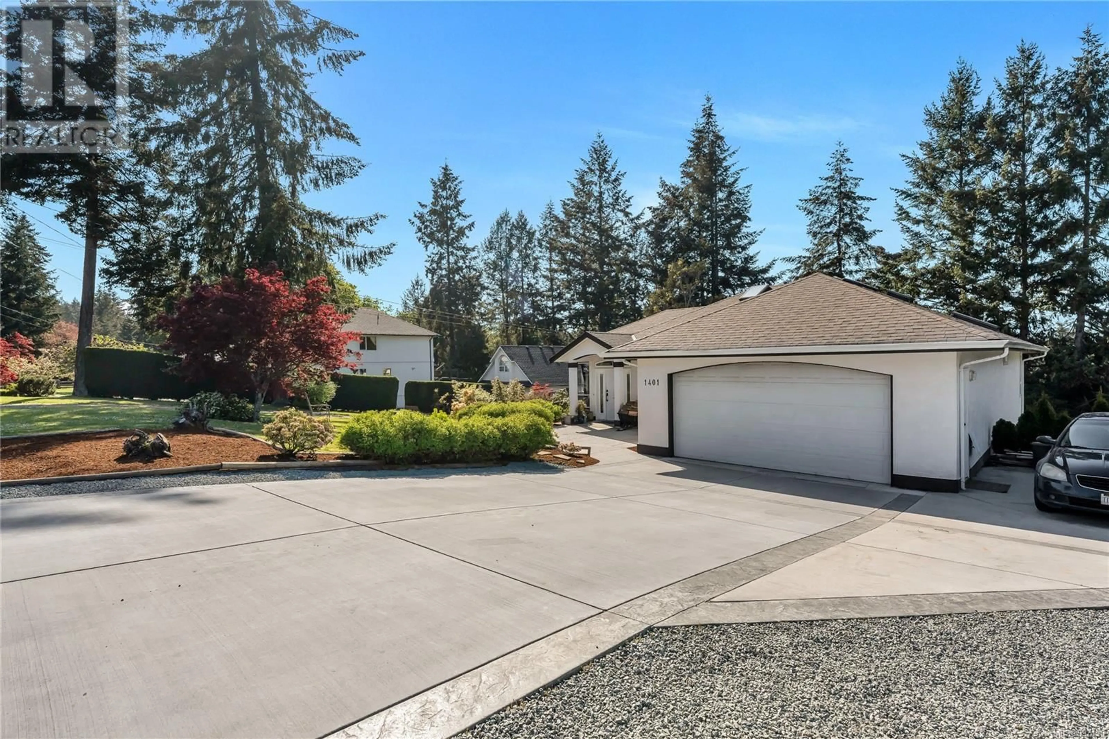 Home with vinyl exterior material, street for 1401 DONNAY DRIVE, Duncan British Columbia V9L5R4